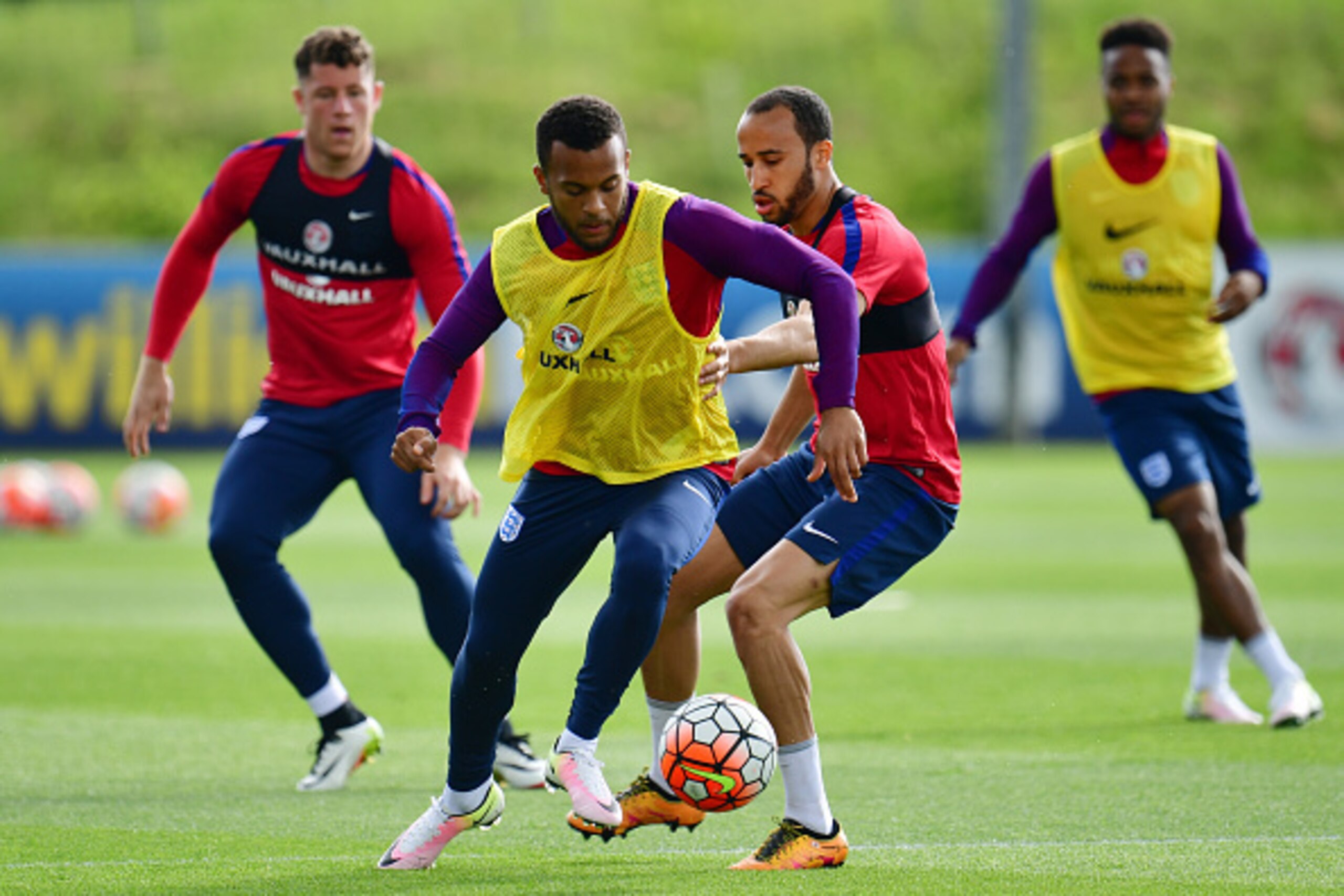 BURTON-UPON-TRENT, ENGLAND - MAY 18: Ryan Bertrand is tackled by Andros Townsend during the England training session at St Georges Park on May 18, 2016 in Burton-upon-Trent, England. (Photo by Dan Mullan/Getty Images) BURTON-UPON-TRENT, ENGLAND - MAY 18: Ryan Bertrand is tackled by Andros Townsend during the England training session at St Georges Park on May 18, 2016 in Burton-upon-Trent, England. (Photo by Dan Mullan/Getty Images)