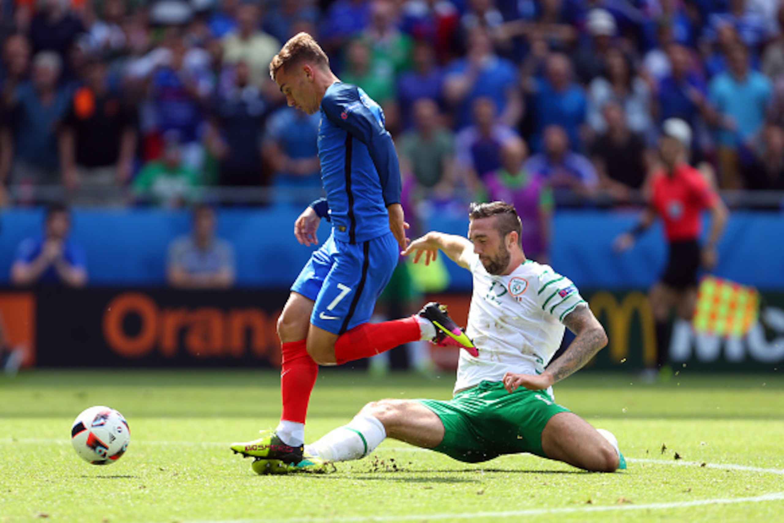 LYON, FRANCE - JUNE 26: Shane Duffy of Republic of Ireland tackles Antoine Griezmann of France and is subsequently sent off during the UEFA EURO 2016 Round of 16 match between France and Republic of Ireland at Stade des Lumieres on June 26, 2016 in Lyon, LYON, FRANCE - JUNE 26: Shane Duffy of Republic of Ireland tackles Antoine Griezmann of France and is subsequently sent off during the UEFA EURO 2016 Round of 16 match between France and Republic of Ireland at Stade des Lumieres on June 26, 2016 in Lyon,