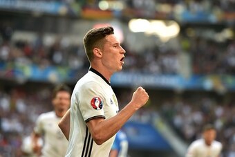 Germany's midfielder Julian Draxler celebrates after scoring during the Euro 2016 round of 16 football match between Germany and Slovakia at the Pierre-Mauroy stadium in Villeneuve-d'Ascq, near Lille, on June 26, 2016.   / AFP / PHILIPPE HUGUEN        (Ph
