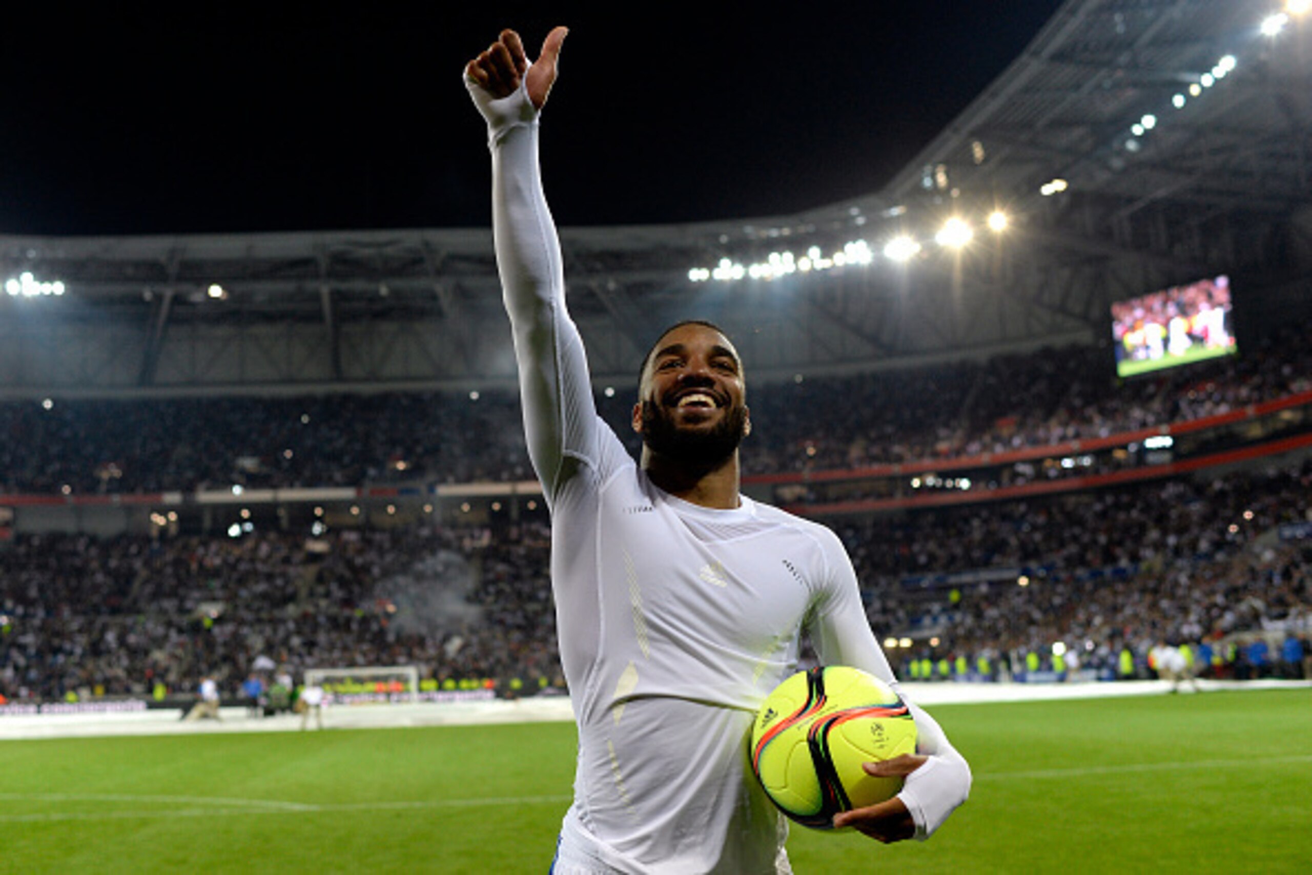 Lyon's French forward Alexandre Lacazette (L) jubilates at the end of the French L1 football match between Lyon (OL) and Monaco (ASM) at the Parc de l'Olympique Lyonnais in Decines-Charpieu, central eastern France, on May 7, 2016. / AFP / ROMAIN LAFABREG Lyon's French forward Alexandre Lacazette (L) jubilates at the end of the French L1 football match between Lyon (OL) and Monaco (ASM) at the Parc de l'Olympique Lyonnais in Decines-Charpieu, central eastern France, on May 7, 2016. / AFP / ROMAIN LAFABREG