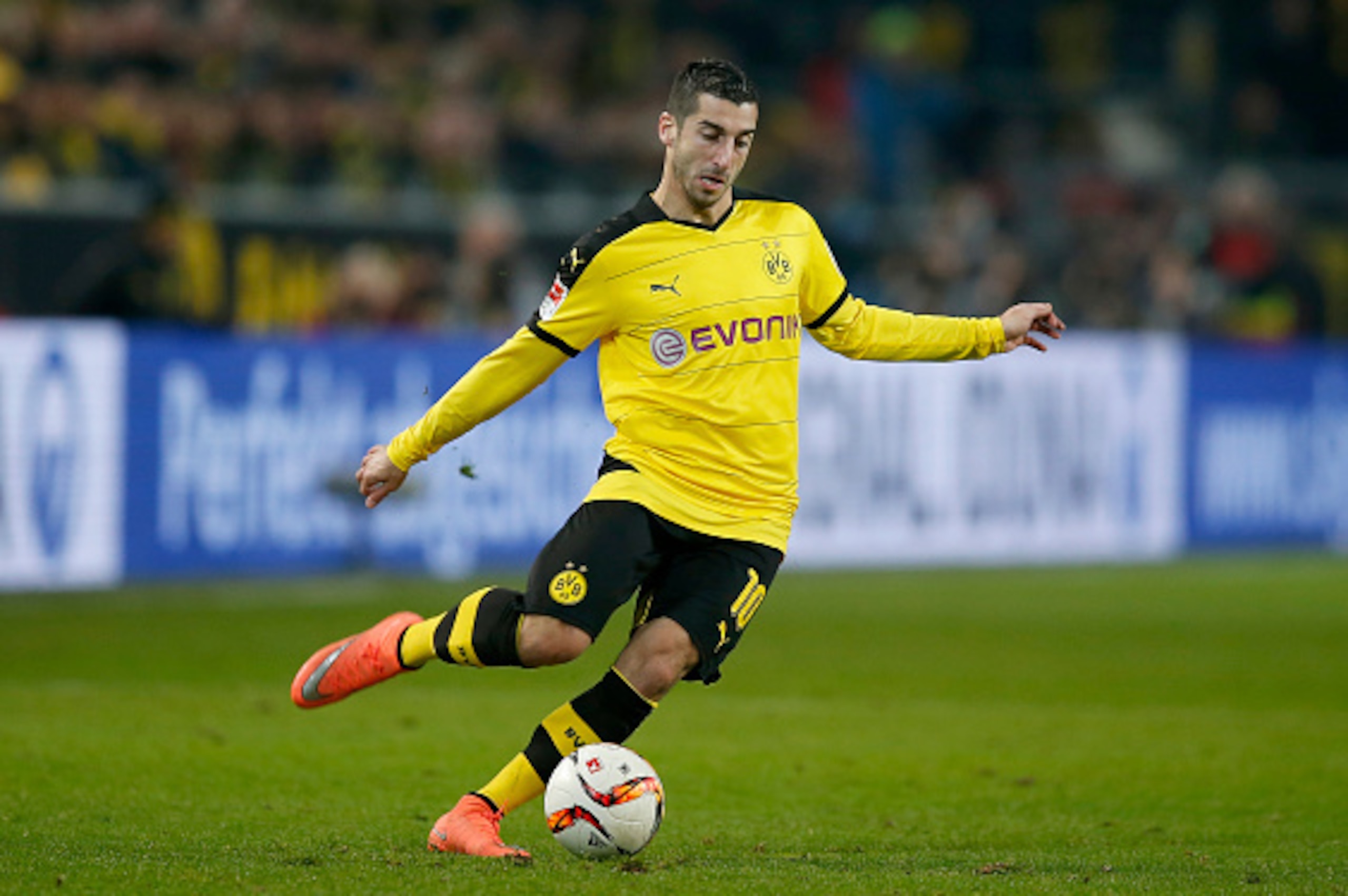 DORTMUND, GERMANY - MARCH 05:  Henrikh Mkhitaryan of Borussia Dortmund runs with the ball during the Bundesliga match between Borussia Dortmund and FC Bayern Muenchen at Signal Iduna Park on March 5, 2016 in Dortmund, Germany.bs  (Photo by Boris Streubel/