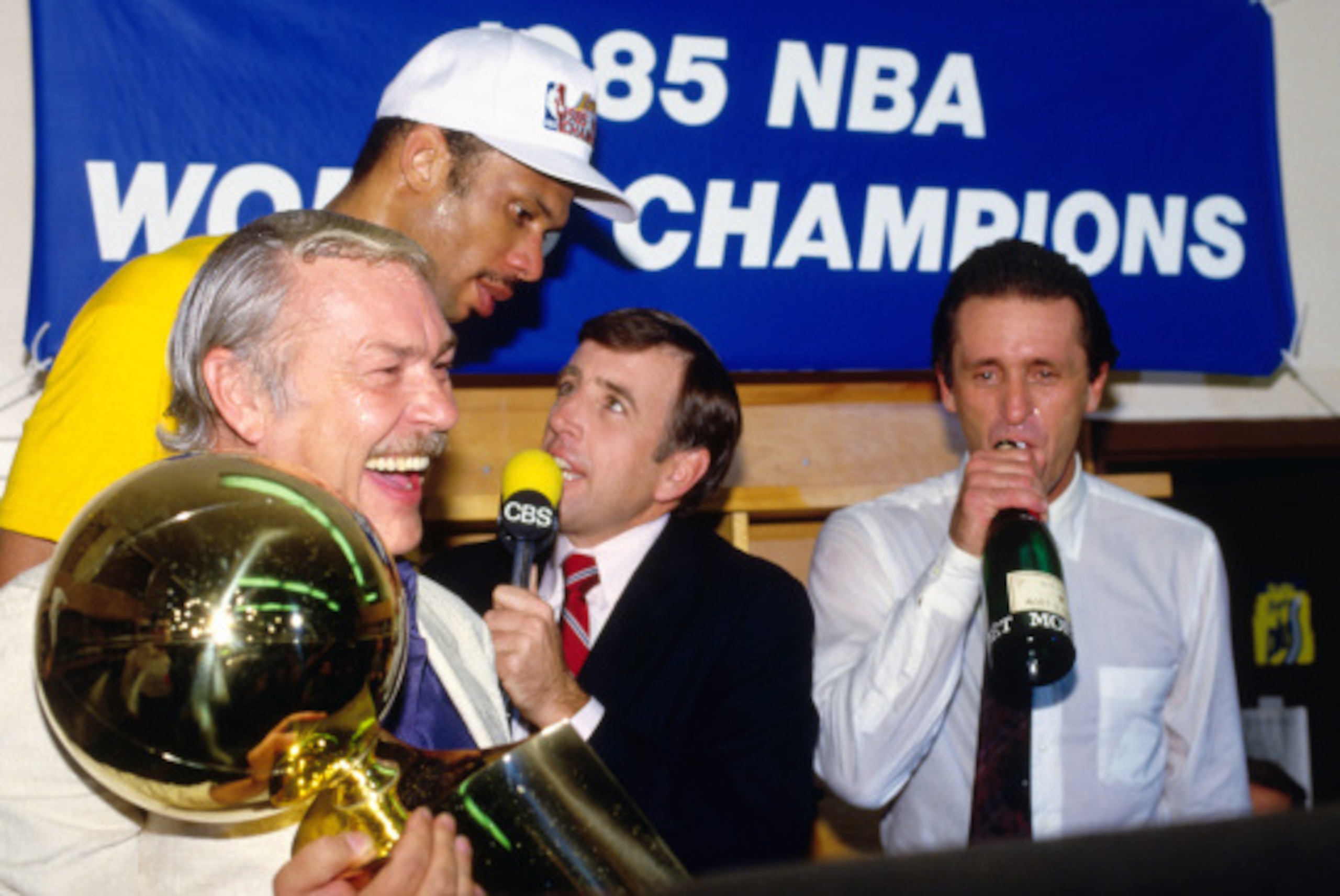 BOSTON, MA - JUNE 9: Owner Jerry Buss, head coach Pat Riley, and Kareem Abdul-Jabbar #33 of the Los Angeles Lakers celebrate the 1985 NBA Championship after defeating the Boston Celtics in Game Six of the NBA Finals on June 9, 1985 at the Boston Garden in