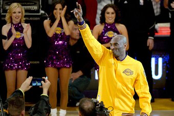 LOS ANGELES, CA - APRIL 13:  Kobe Bryant #24 of the Los Angeles Lakers waves to the crowd as he walks on the court before the game against the Utah Jazz on April 13, 2016 at Staples Center in Los Angeles, California.  (Photo by Kevork Djansezian/Getty Ima