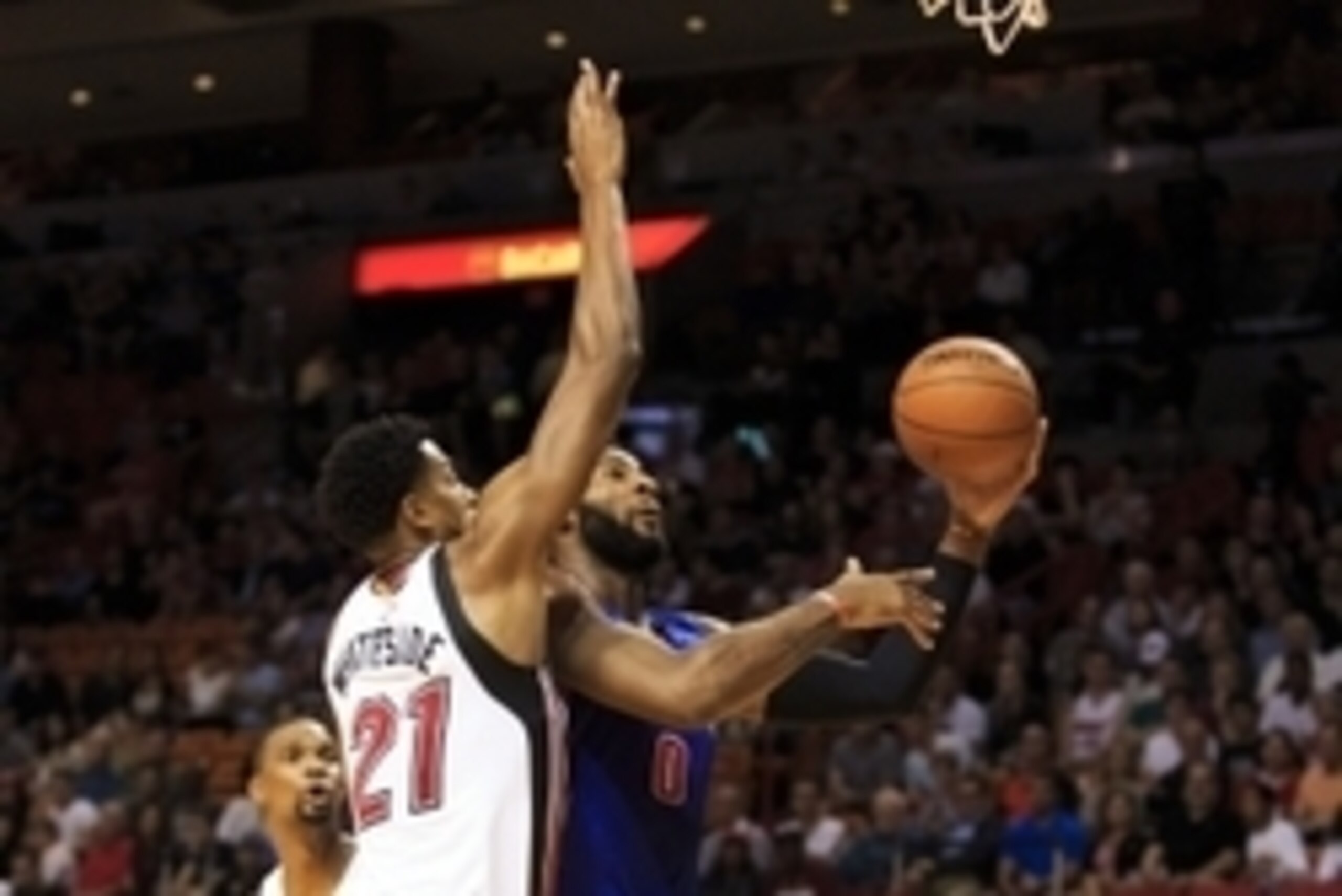 Dec 22, 2015; Miami, FL, USA; Detroit Pistons center Andre Drummond (0) drives to the basket as Miami Heat center Hassan Whiteside (21) defends the play during the first half at American Airlines Arena. Mandatory Credit: Steve Mitchell-USA TODAY Sports