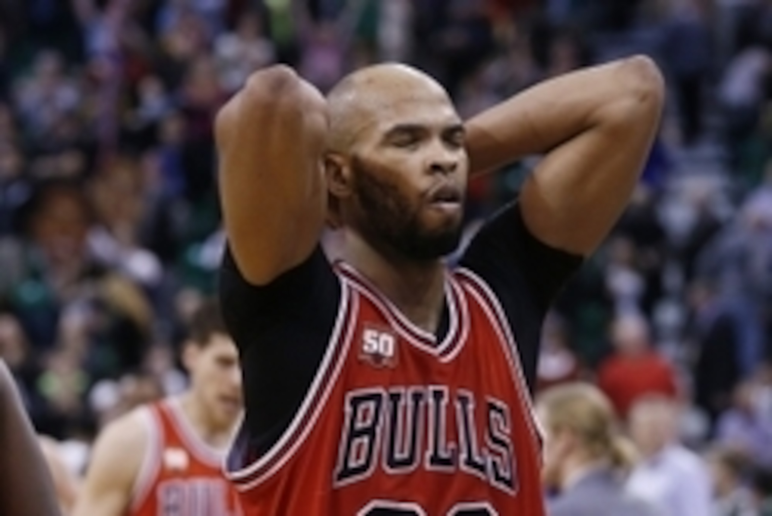 Feb 1, 2016; Salt Lake City, UT, USA;  Chicago Bulls forward Taj Gibson (22) walks off the court after their 105-96 overtime loss to the Utah Jazz at Vivint Smart Home Arena. Mandatory Credit: Jeff Swinger-USA TODAY Sports