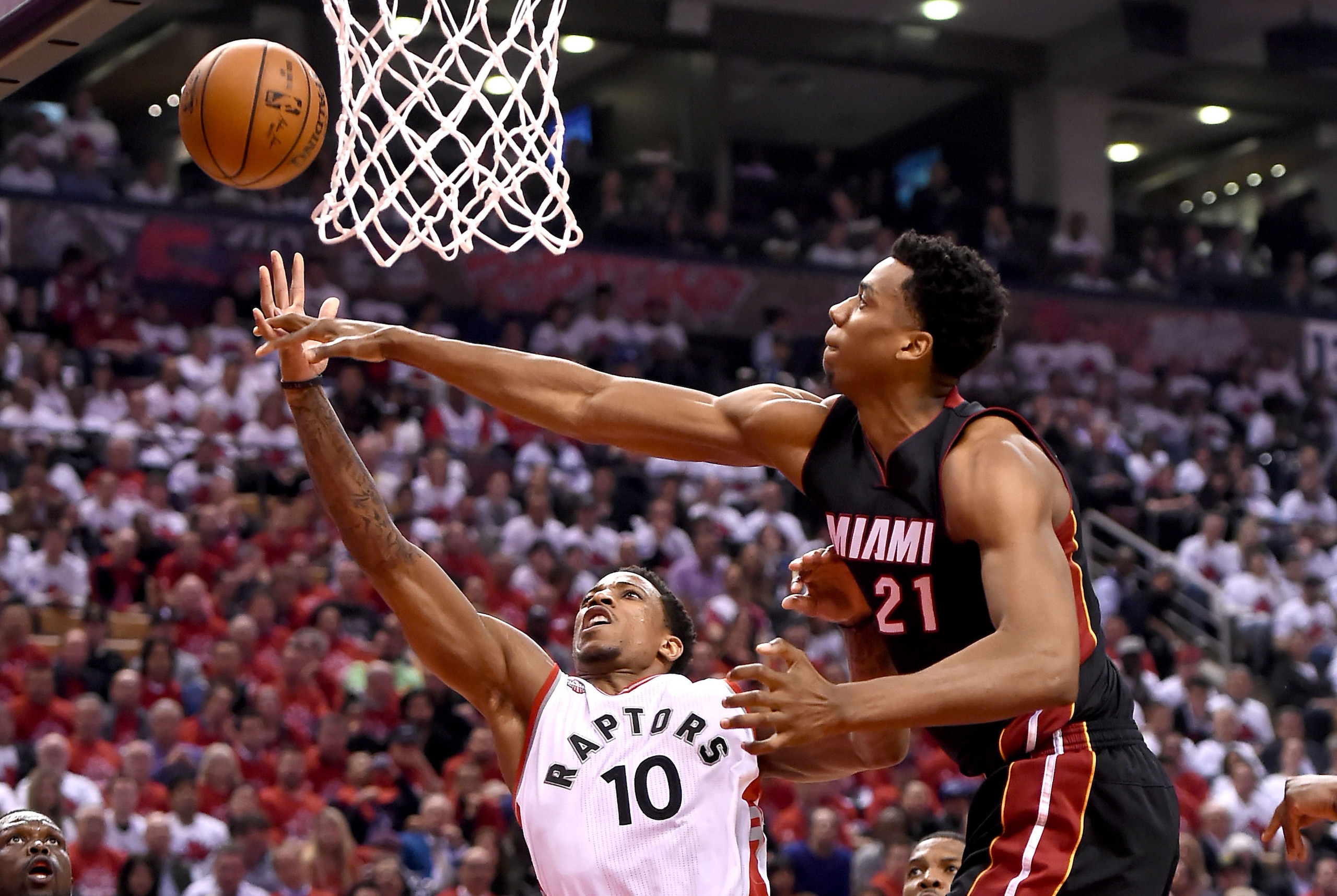 May 3, 2016; Toronto, Ontario, CAN;  Toronto Raptors guard DeMar DeRozan (10) has a shot blocked by Miami Heat  center Hassan Whiteside (21)  in game one of the second round of the NBA Playoffs at Air Canada Centre. The Heat won 102-96.  Mandatory Credit: