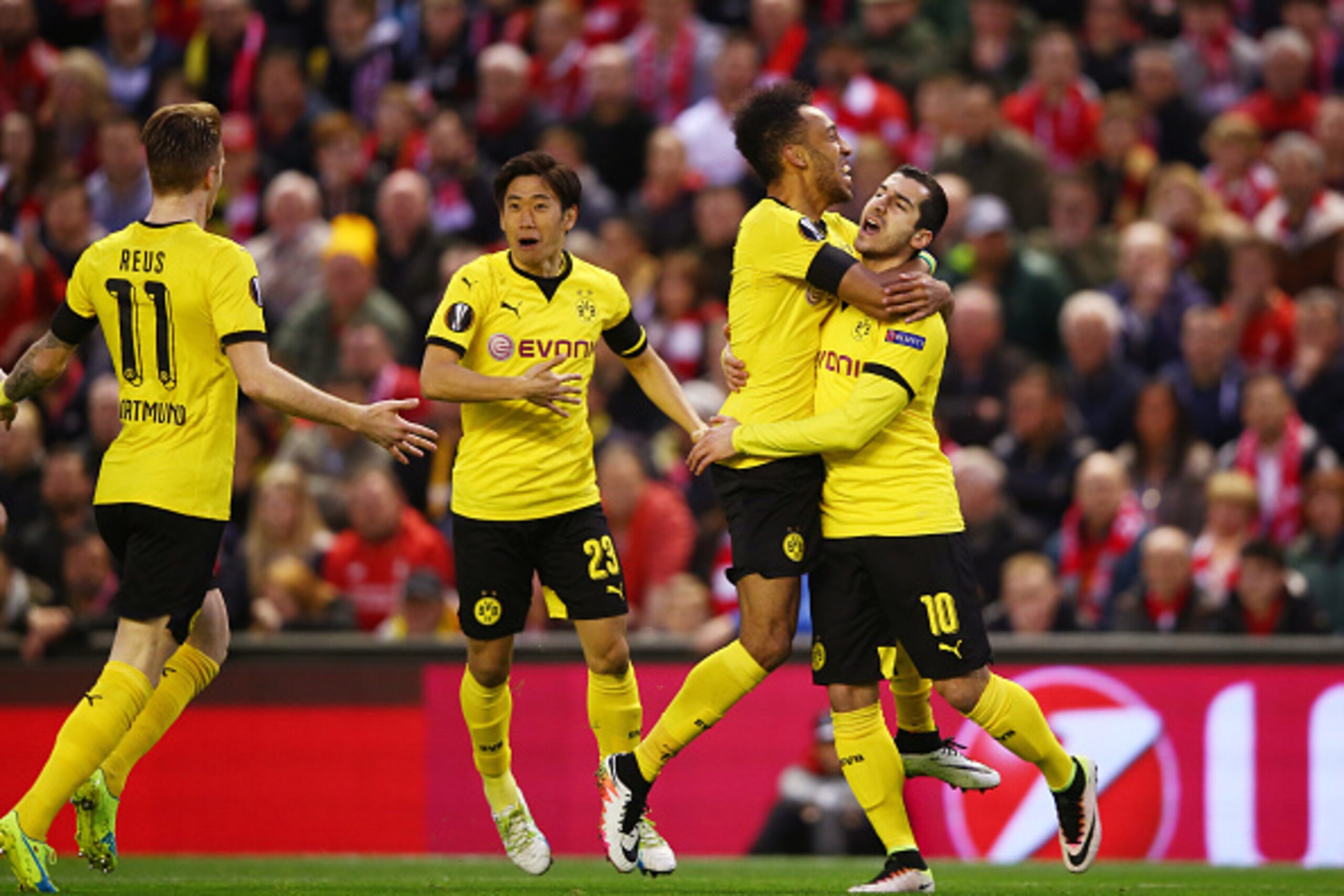LIVERPOOL, ENGLAND - APRIL 14: Henrikh Mkhitaryan (R) of Borussia Dortmund celebrates scoring his team's opening goal with Pierre-Emerick Aubameyang during the UEFA Europa League quarter final, second leg match between Liverpool and Borussia Dortmund at A LIVERPOOL, ENGLAND - APRIL 14: Henrikh Mkhitaryan (R) of Borussia Dortmund celebrates scoring his team's opening goal with Pierre-Emerick Aubameyang during the UEFA Europa League quarter final, second leg match between Liverpool and Borussia Dortmund at A