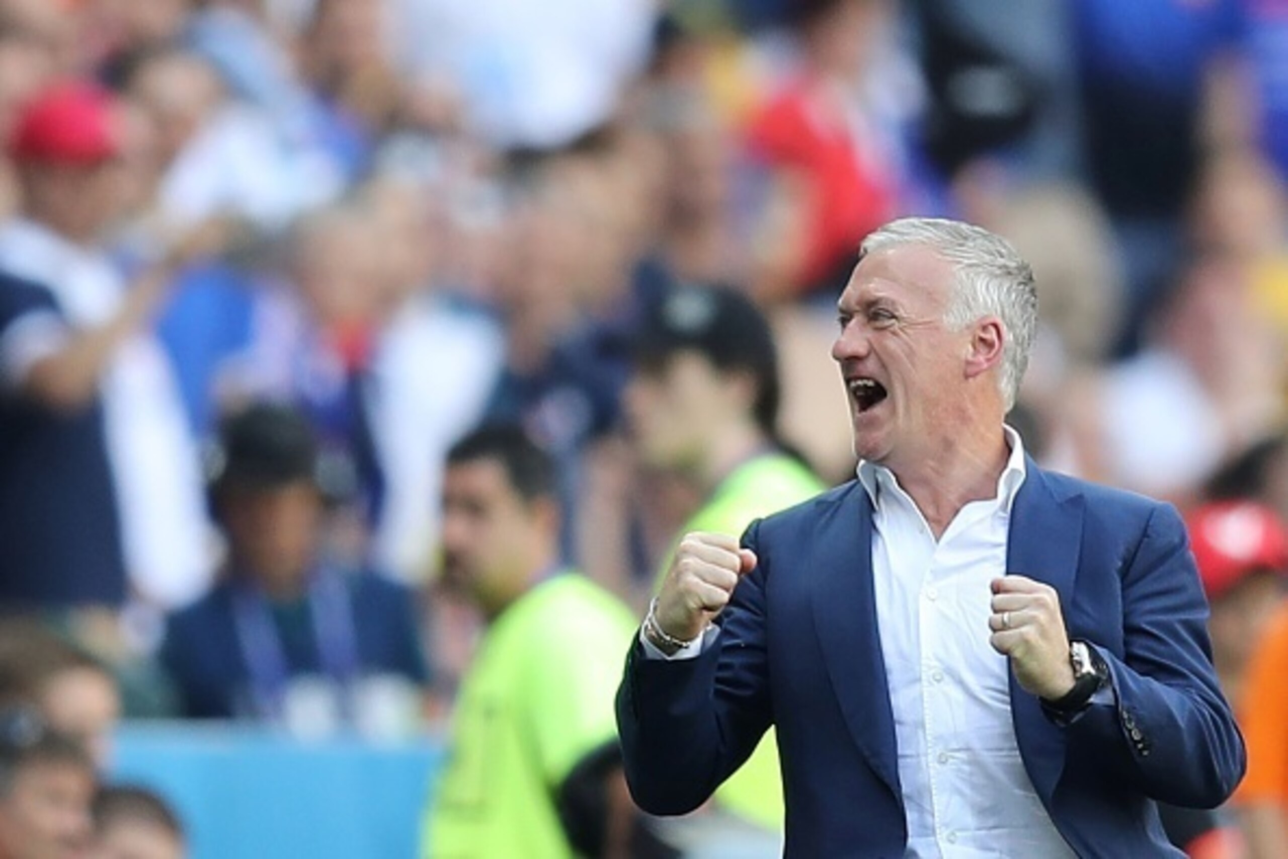 TOPSHOT - France's coach Didier Deschamps celebrates his team's win after the Euro 2016 round of 16 football match between France and Republic of Ireland at the Parc Olympique Lyonnais stadium in Décines-Charpieu, near Lyon, on June 26, 2016.
France won t