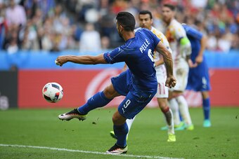 PARIS, FRANCE - JUNE 27: Graziano Pelle of Italy scores his team's second goal during the UEFA EURO 2016 round of 16 match between Italy and Spain at Stade de France on June 27, 2016 in Paris, France.  (Photo by Matthias Hangst/Getty Images)