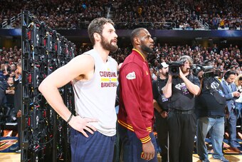 CLEVELAND, OH - JUNE 16:  LeBron James #23 of the Cleveland Cavaliers and Kevin Love #0 of the Cleveland Cavaliers stand on the court before the game against the Golden State Warriors during Game Six of the 2016 NBA Finals on June 16, 2016 at Quicken Loan