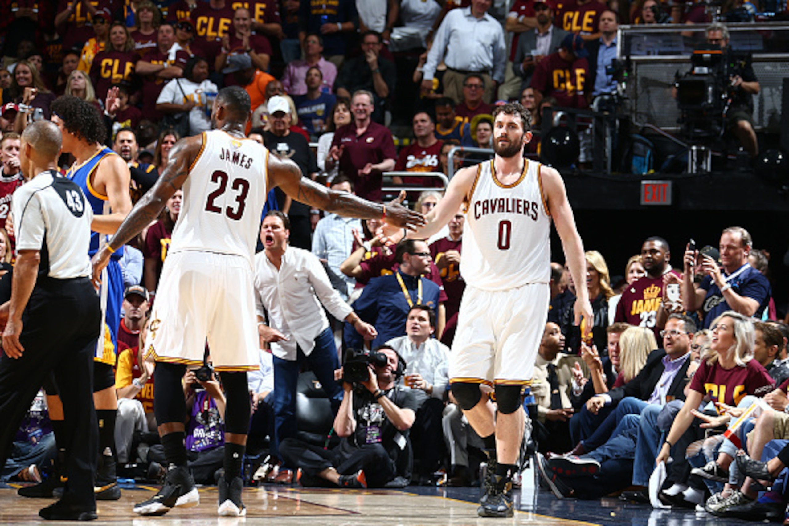 CLEVELAND, OH - JUNE 10: LeBron James #23 high fives teammate Kevin Love #0 of the Cleveland Cavaliers during Game Four of the 2016 NBA Finals against the Golden State Warriors on June 10, 2016 at Quicken Loans Arena in Cleveland, Ohio. NOTE TO USER: User CLEVELAND, OH - JUNE 10: LeBron James #23 high fives teammate Kevin Love #0 of the Cleveland Cavaliers during Game Four of the 2016 NBA Finals against the Golden State Warriors on June 10, 2016 at Quicken Loans Arena in Cleveland, Ohio. NOTE TO USER: User