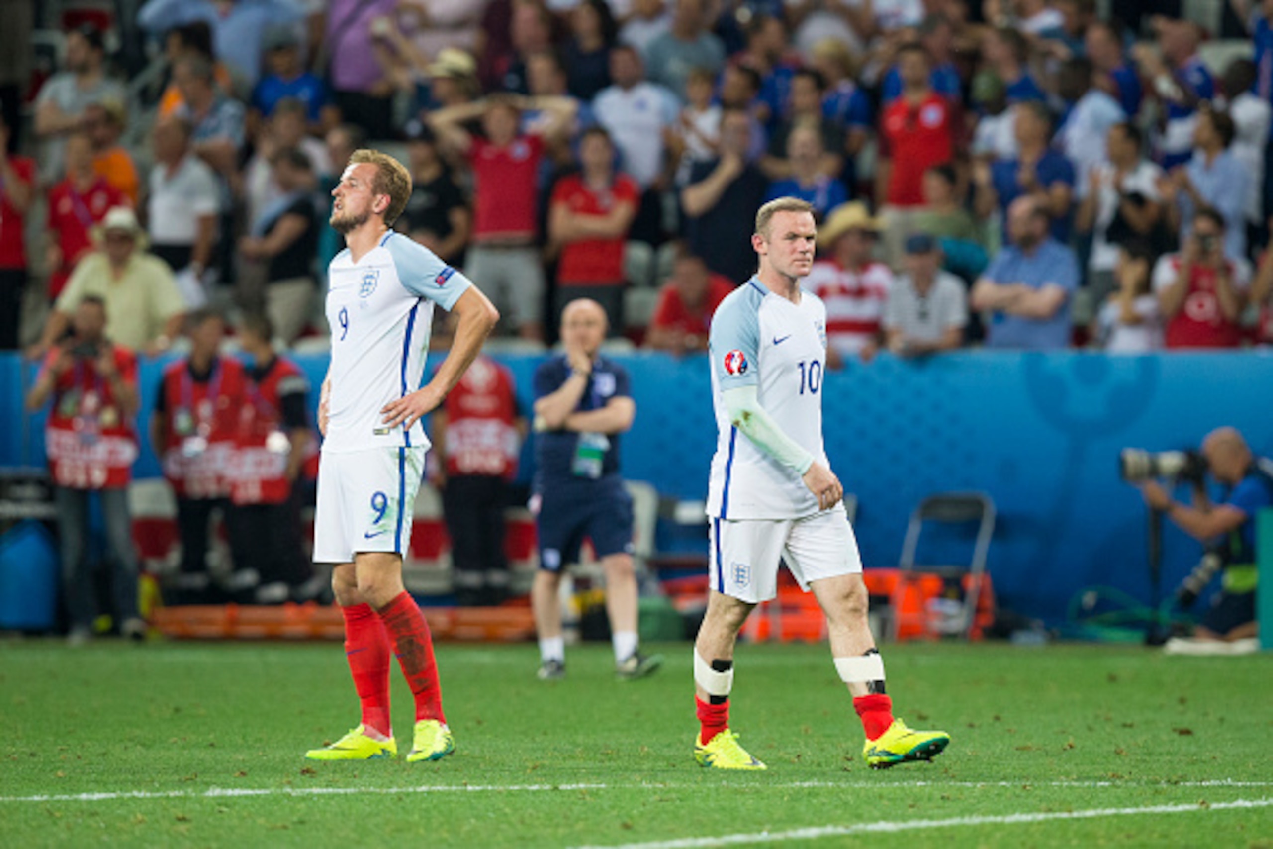 NICE, FRANCE - JUNE 25:  Dejection for England's Harry Kane and Wayne Rooney at full time during the UEFA Euro 2016 Round of 16 match between England and Iceland at Allianz Riviera Stadium on June 27 in Nice, France.  (Photo by Craig Mercer/CameraSport vi