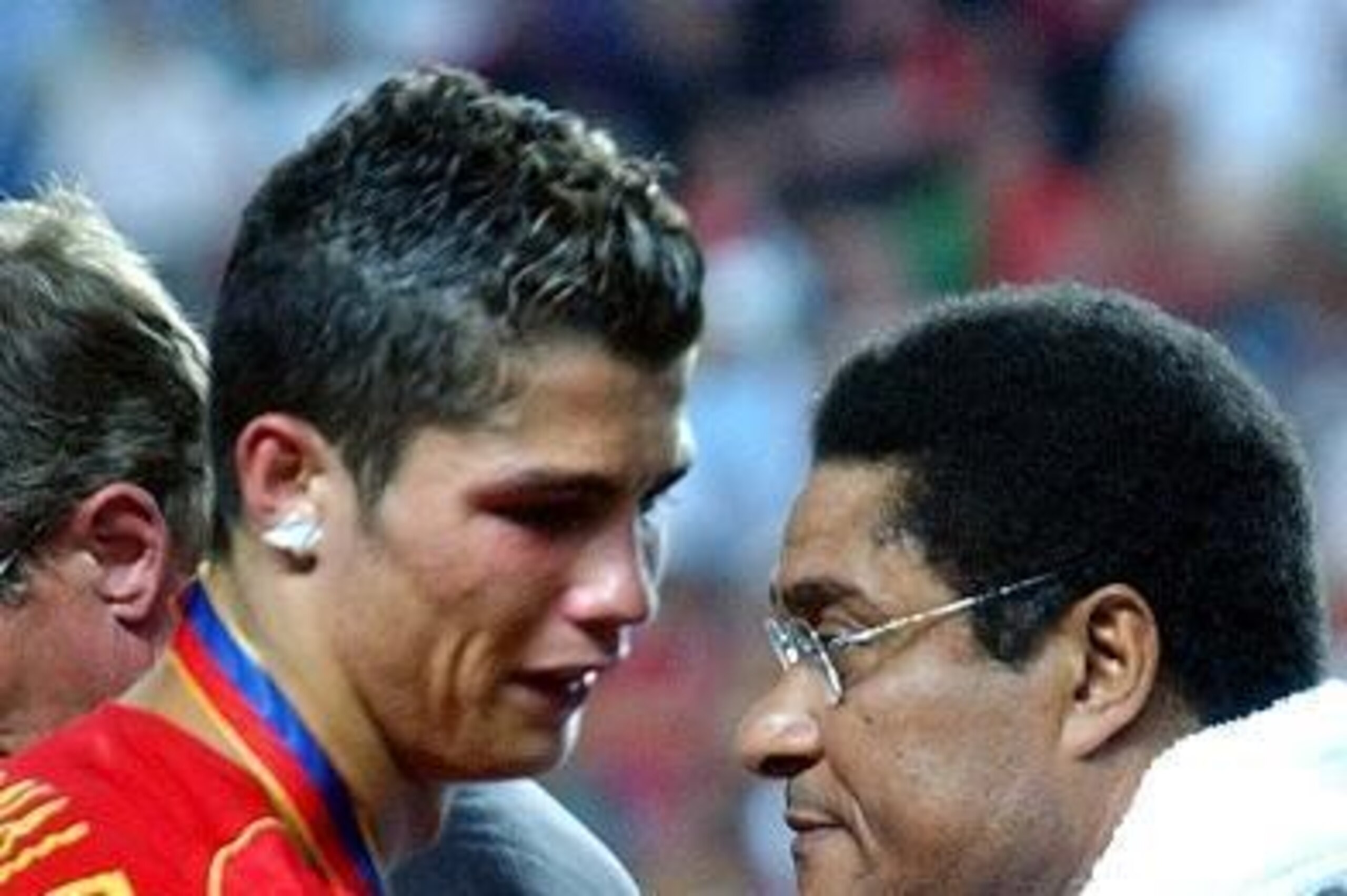 A tearful Ronaldo is consoled by the late Eusebio after the Euro 2004 final