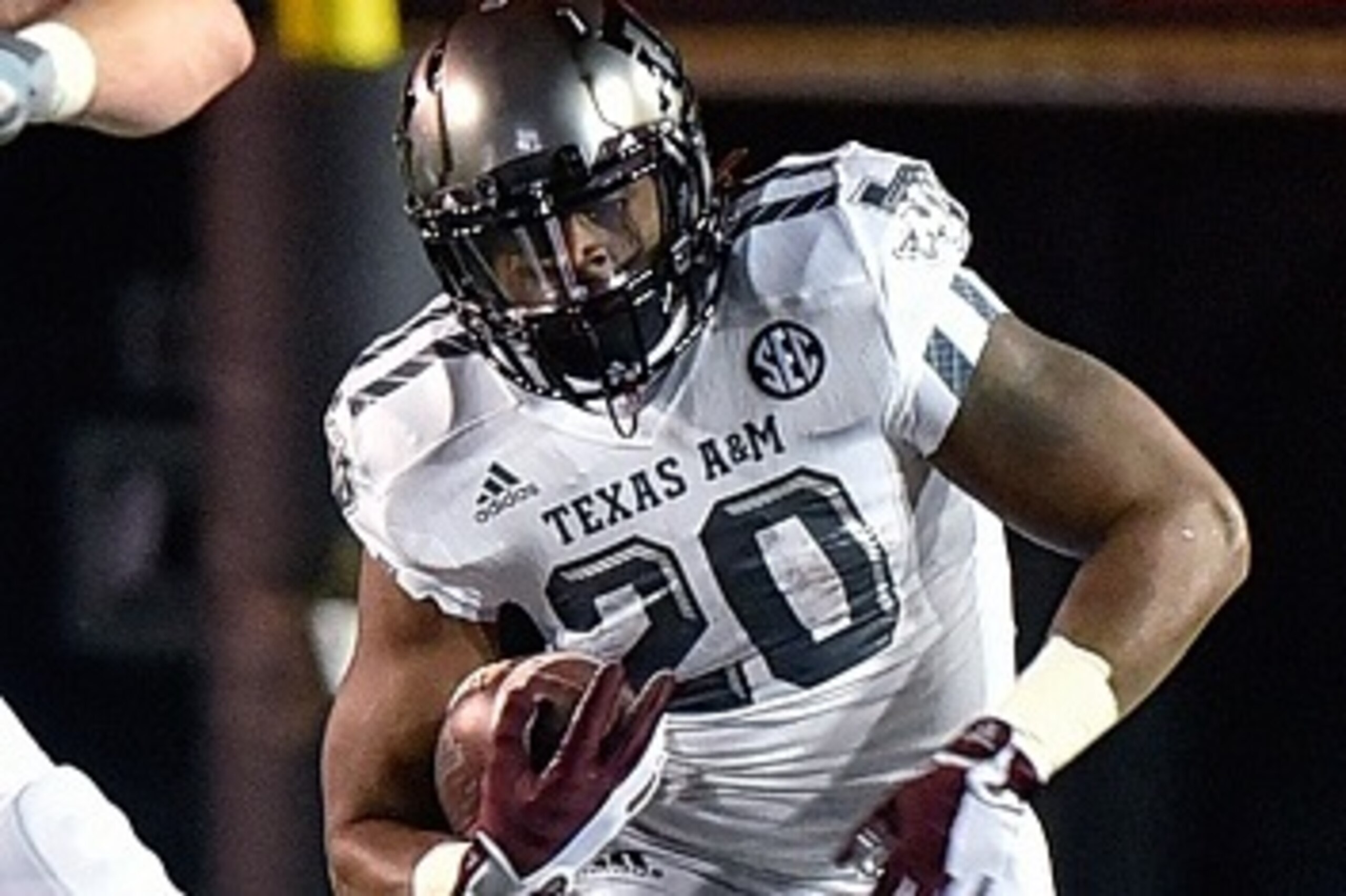 NASHVILLE, TN - NOVEMBER 21:  James White #20 of the Texas A&M Aggies plays against the Vanderbilt Commodores at Vanderbilt Stadium on November 21, 2015 in Nashville, Tennessee.  (Photo by Frederick Breedon/Getty Images)