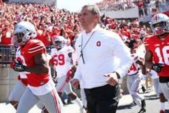 Apr 16, 2016; Columbus, OH, USA; Ohio State head coach Urban Meyer leads the Scarlet and Gray teams onto the field prior to the spring game at Ohio Stadium. Mandatory Credit: Aaron Doster-USA TODAY Sports