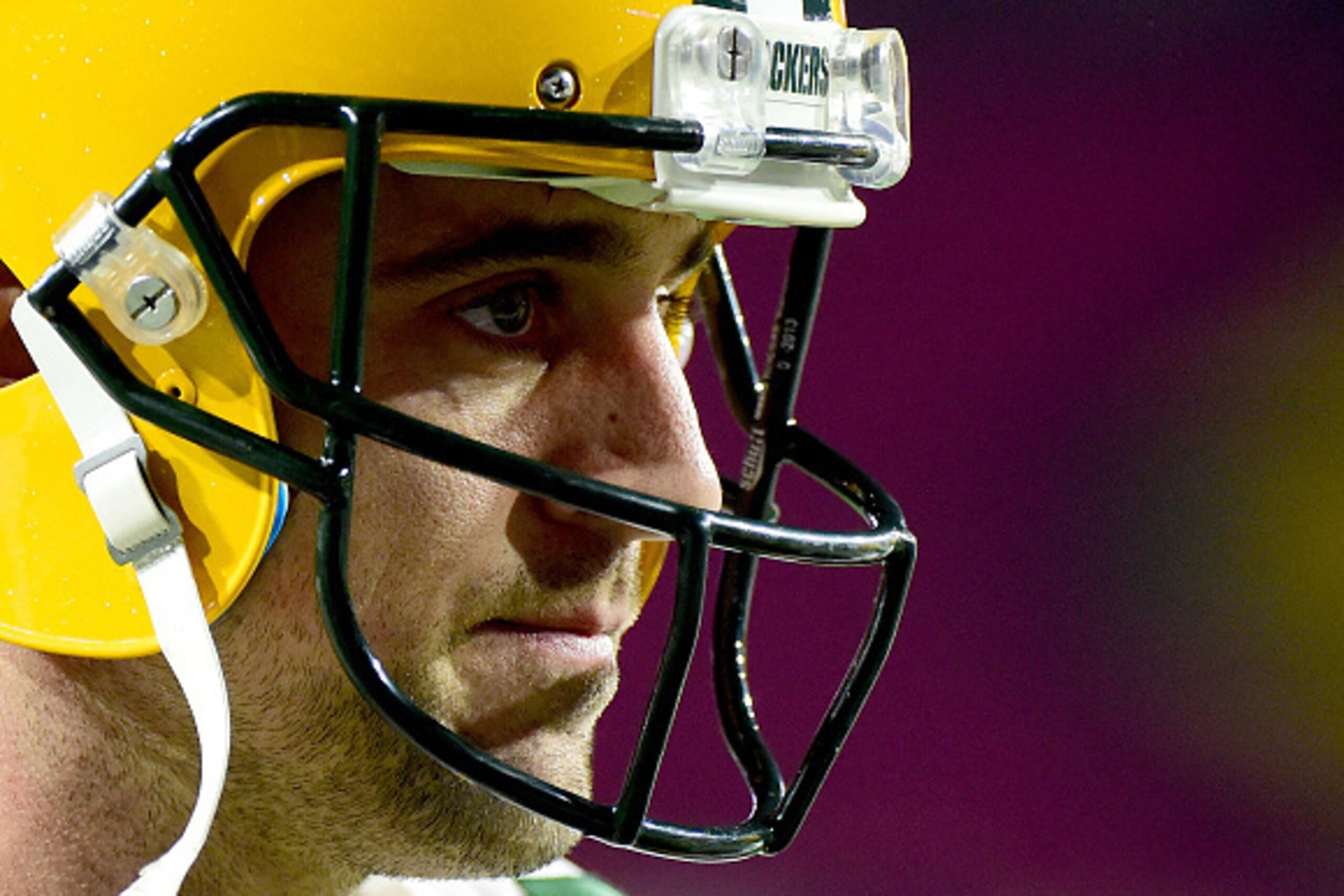 GLENDALE, AZ - JANUARY 16:  Quarterback Aaron Rodgers #12 of the Green Bay Packers looks on before taking on the Arizona Cardinals in the NFC Divisional Playoff Game at University of Phoenix Stadium on January 16, 2016 in Glendale, Arizona.  (Photo by Har
