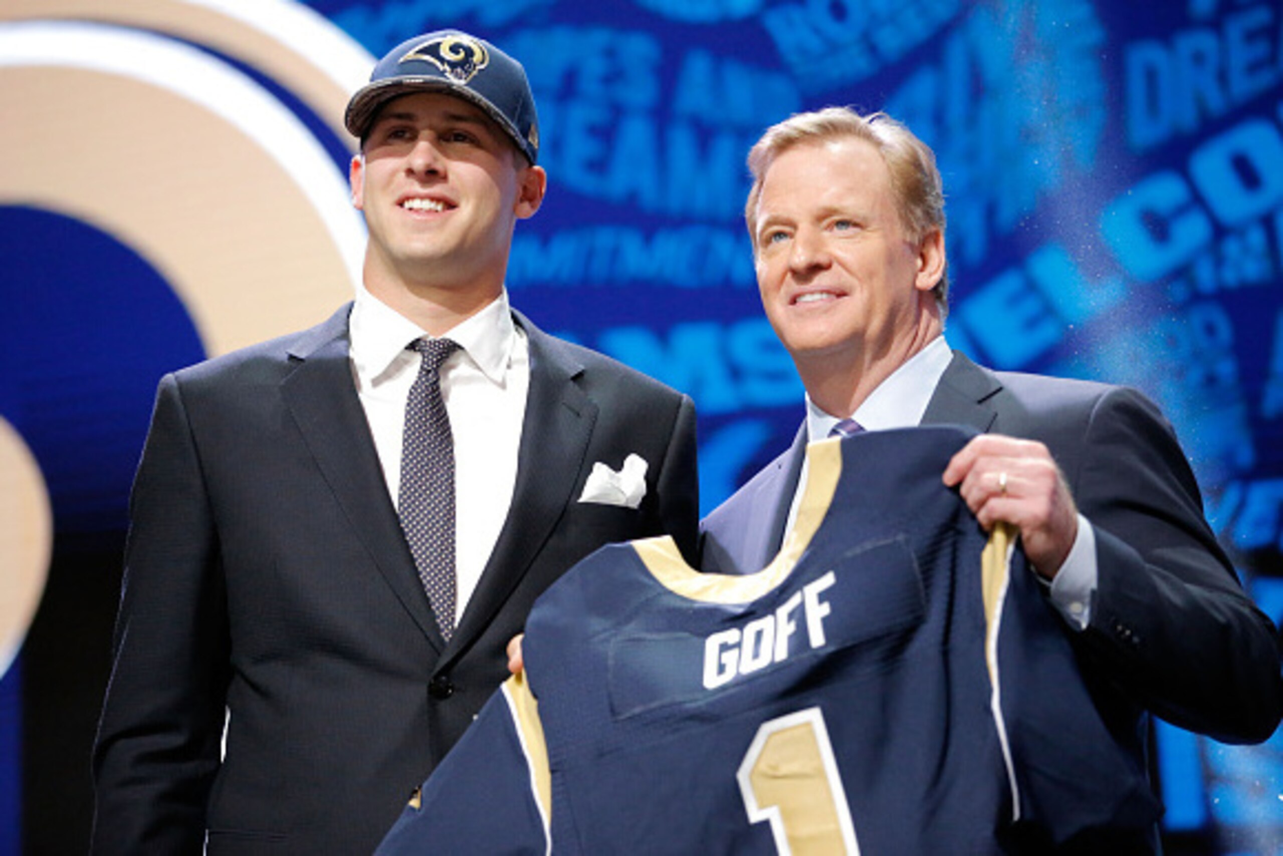 CHICAGO, IL - APRIL 28:  (L-R) Jared Goff of the California Golden Bears holds up a jersey with NFL Commissioner Roger Goodell after being picked #1 overall by the Los Angeles Rams during the first round of the 2016 NFL Draft at the Auditorium Theatre of 