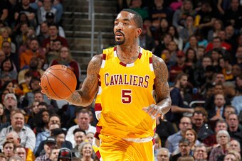 CLEVELAND, OH - JANUARY 30:  J.R. Smith #5 of the Cleveland Cavaliers brings the ball up court against the San Antonio Spurs on January 30, 2016 at Quicken Loans Arena in Cleveland, Ohio. NOTE TO USER: User expressly acknowledges and agrees that, by downl