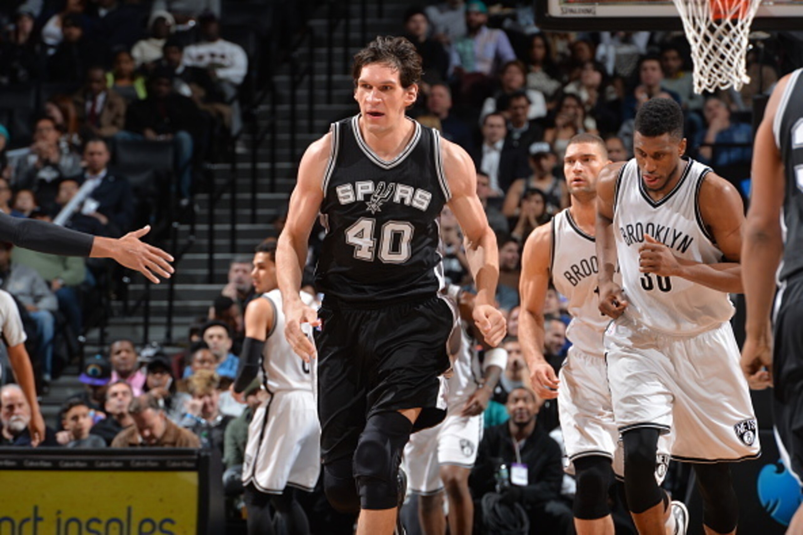 BROOKLYN, NY - JANUARY 11: Boban Marjanovic #40 of the San Antonio Spurs runs up court against the Brooklyn Nets on January 11, 2015 at Barclays Center in Brooklyn, New York. NOTE TO USER: User expressly acknowledges and agrees that, by downloading and o BROOKLYN, NY - JANUARY 11: Boban Marjanovic #40 of the San Antonio Spurs runs up court against the Brooklyn Nets on January 11, 2015 at Barclays Center in Brooklyn, New York. NOTE TO USER: User expressly acknowledges and agrees that, by downloading and o
