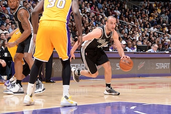 LOS ANGELES, CA - JANUARY 22: Manu Ginobili #20 of the San Antonio Spurs drives to the basket against the Los Angeles Lakers during the game on January 22, 2016 at STAPLES Center in Lost Angeles, California. NOTE TO USER: User expressly acknowledges and a