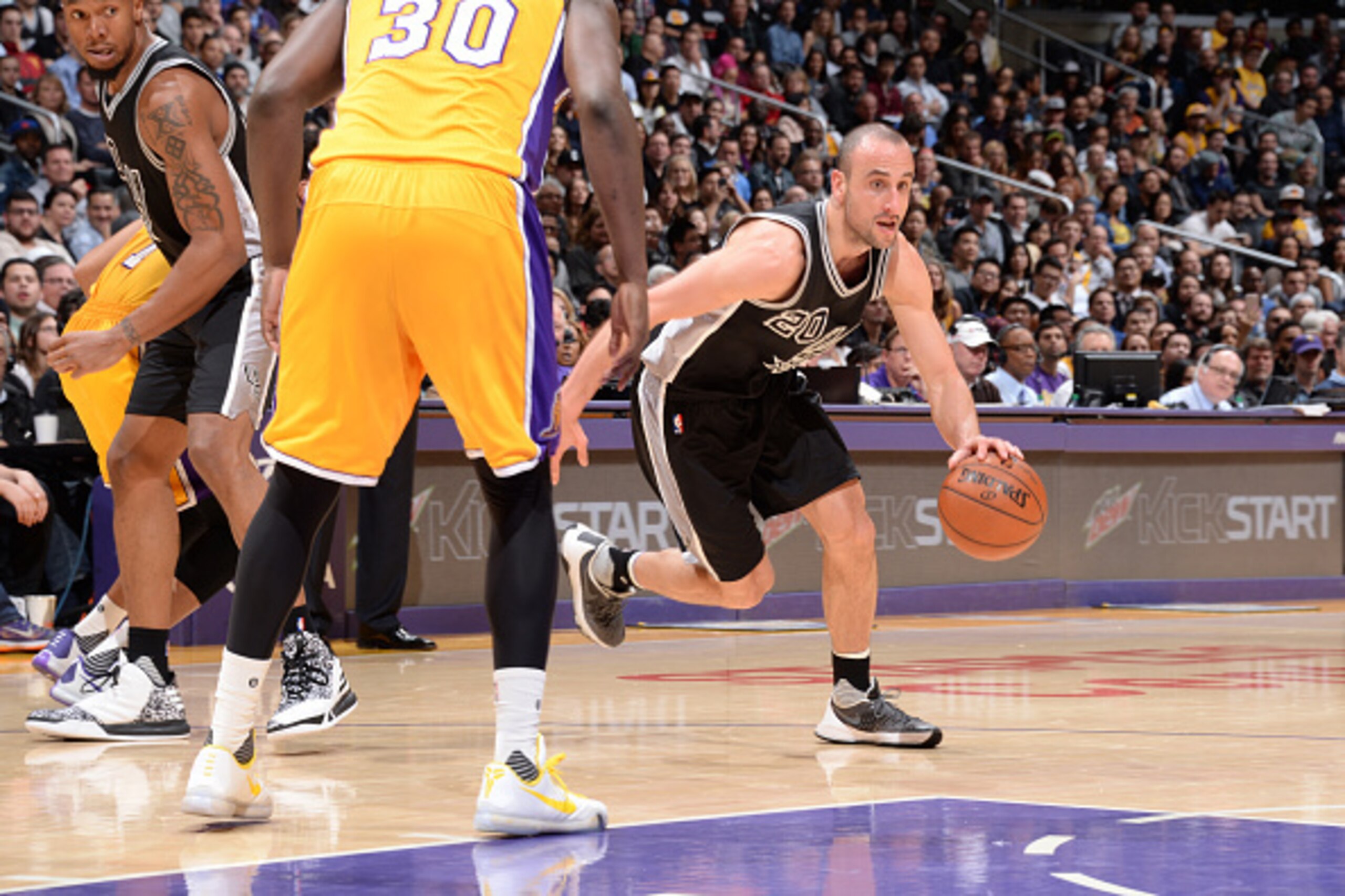 LOS ANGELES, CA - JANUARY 22: Manu Ginobili #20 of the San Antonio Spurs drives to the basket against the Los Angeles Lakers during the game on January 22, 2016 at STAPLES Center in Lost Angeles, California. NOTE TO USER: User expressly acknowledges and a LOS ANGELES, CA - JANUARY 22: Manu Ginobili #20 of the San Antonio Spurs drives to the basket against the Los Angeles Lakers during the game on January 22, 2016 at STAPLES Center in Lost Angeles, California. NOTE TO USER: User expressly acknowledges and a