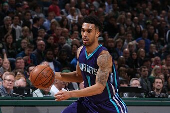 Milwaukee, WI - MARCH 26:  Courtney Lee #1 of the Charlotte Hornets handles the ball against the Milwaukee Bucks on March 26, 2016 at the BMO Harris Bradley Center in Milwaukee, Wisconsin. NOTE TO USER: User expressly acknowledges and agrees that, by down