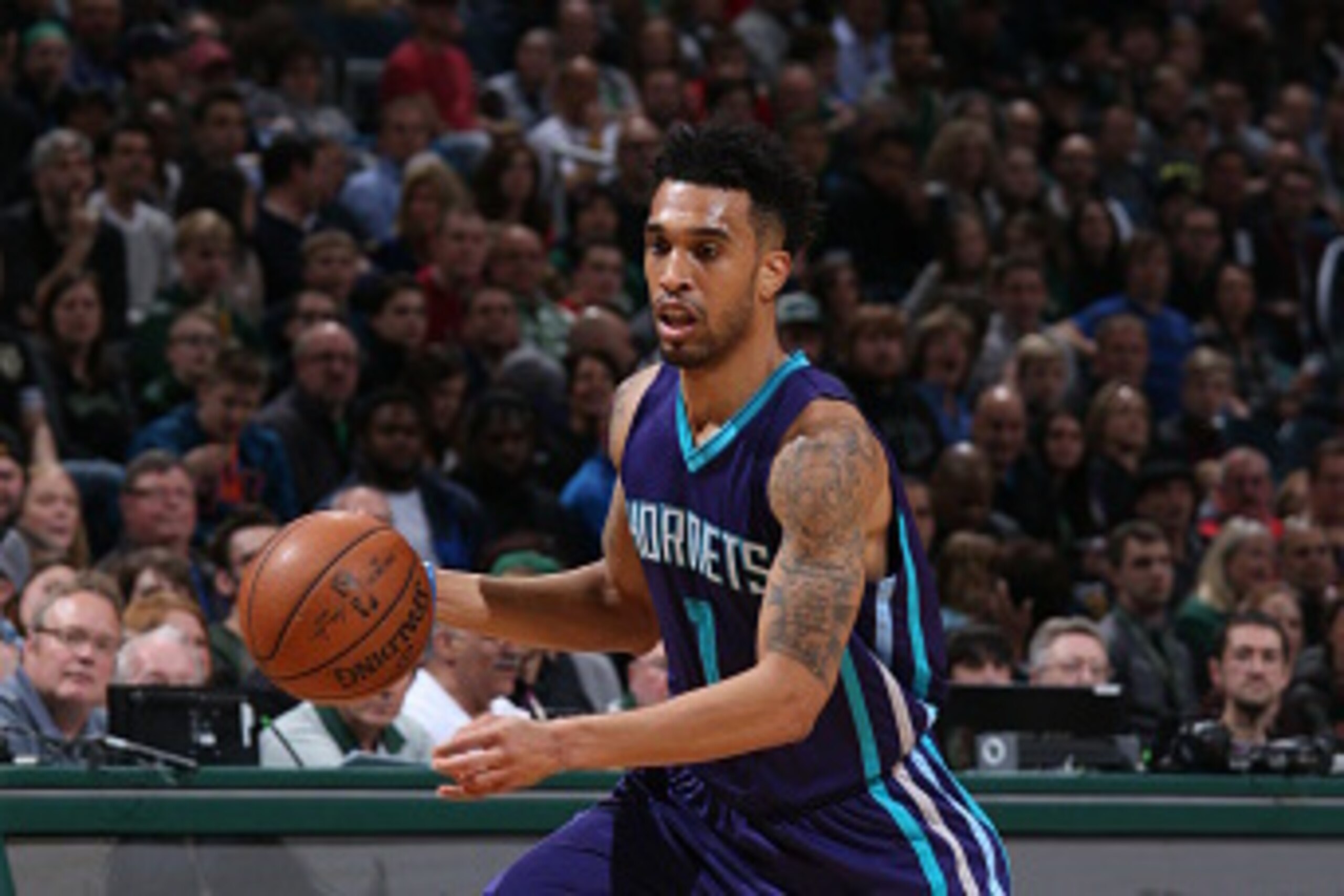 Milwaukee, WI - MARCH 26: Courtney Lee #1 of the Charlotte Hornets handles the ball against the Milwaukee Bucks on March 26, 2016 at the BMO Harris Bradley Center in Milwaukee, Wisconsin. NOTE TO USER: User expressly acknowledges and agrees that, by down Milwaukee, WI - MARCH 26: Courtney Lee #1 of the Charlotte Hornets handles the ball against the Milwaukee Bucks on March 26, 2016 at the BMO Harris Bradley Center in Milwaukee, Wisconsin. NOTE TO USER: User expressly acknowledges and agrees that, by down