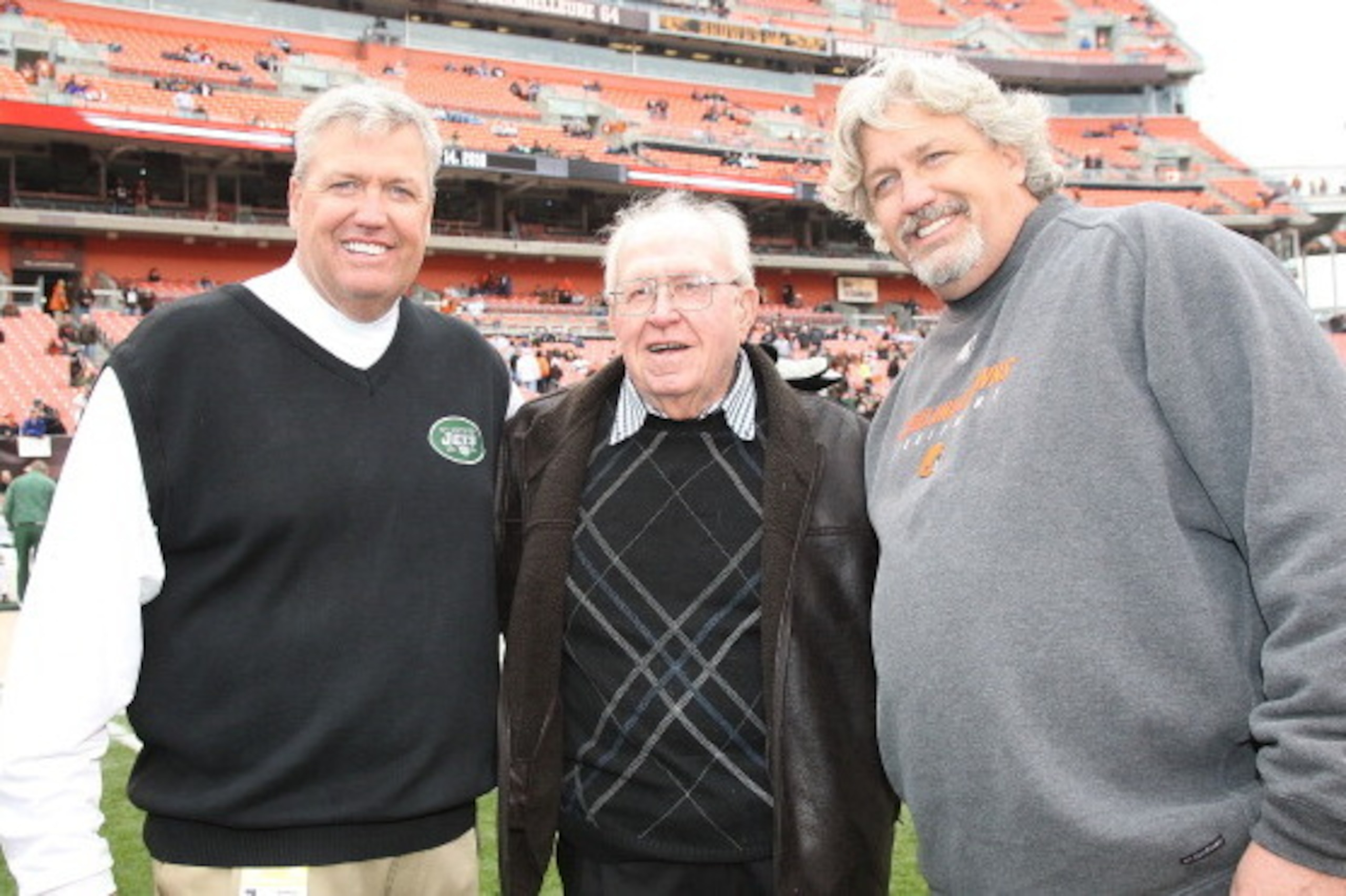 CLEVELAND - NOVEMBER 14: Head Coach Rex Ryan of the New York Jets meets with his twin brother, Defensive Coordinator Rob Ryan of the Cleveland Browns, and their dad, former head coach Buddy Ryan, when the Cleveland Browns host the New York Jets at Clevel CLEVELAND - NOVEMBER 14: Head Coach Rex Ryan of the New York Jets meets with his twin brother, Defensive Coordinator Rob Ryan of the Cleveland Browns, and their dad, former head coach Buddy Ryan, when the Cleveland Browns host the New York Jets at Clevel