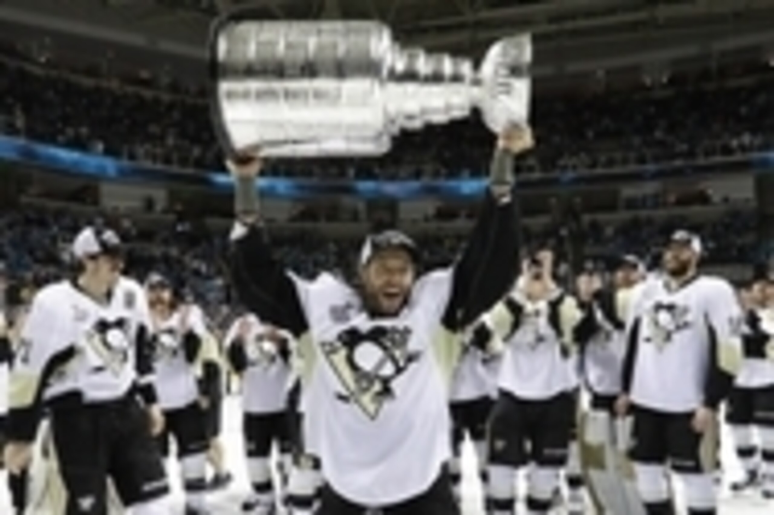 Jun 12, 2016; San Jose, CA, USA; Pittsburgh Penguins center Matt Cullen (7) celebrates and hoists the Stanley Cup after defeating the San Jose Sharks in game six of the 2016 Stanley Cup Final at SAP Center at San Jose. Mandatory Credit: Bruce Bennett/Pool