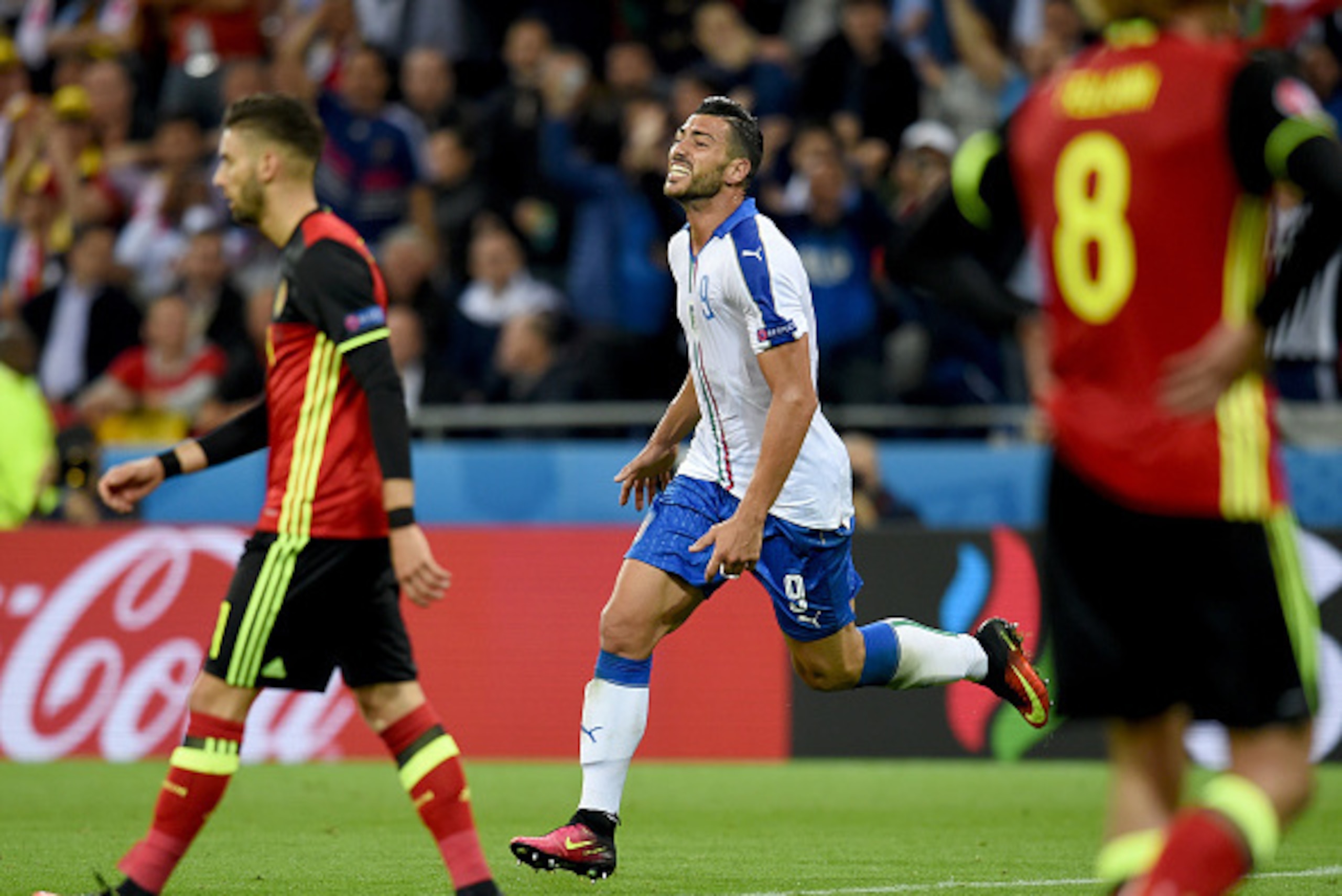 Graziano Pelle of Italy celebrates scoring his team's second goal during the UEFA EURO 2016 Group E match between Belgium and Italy at Stade des Lumieres on June 13, 2016 in Lyon, France.