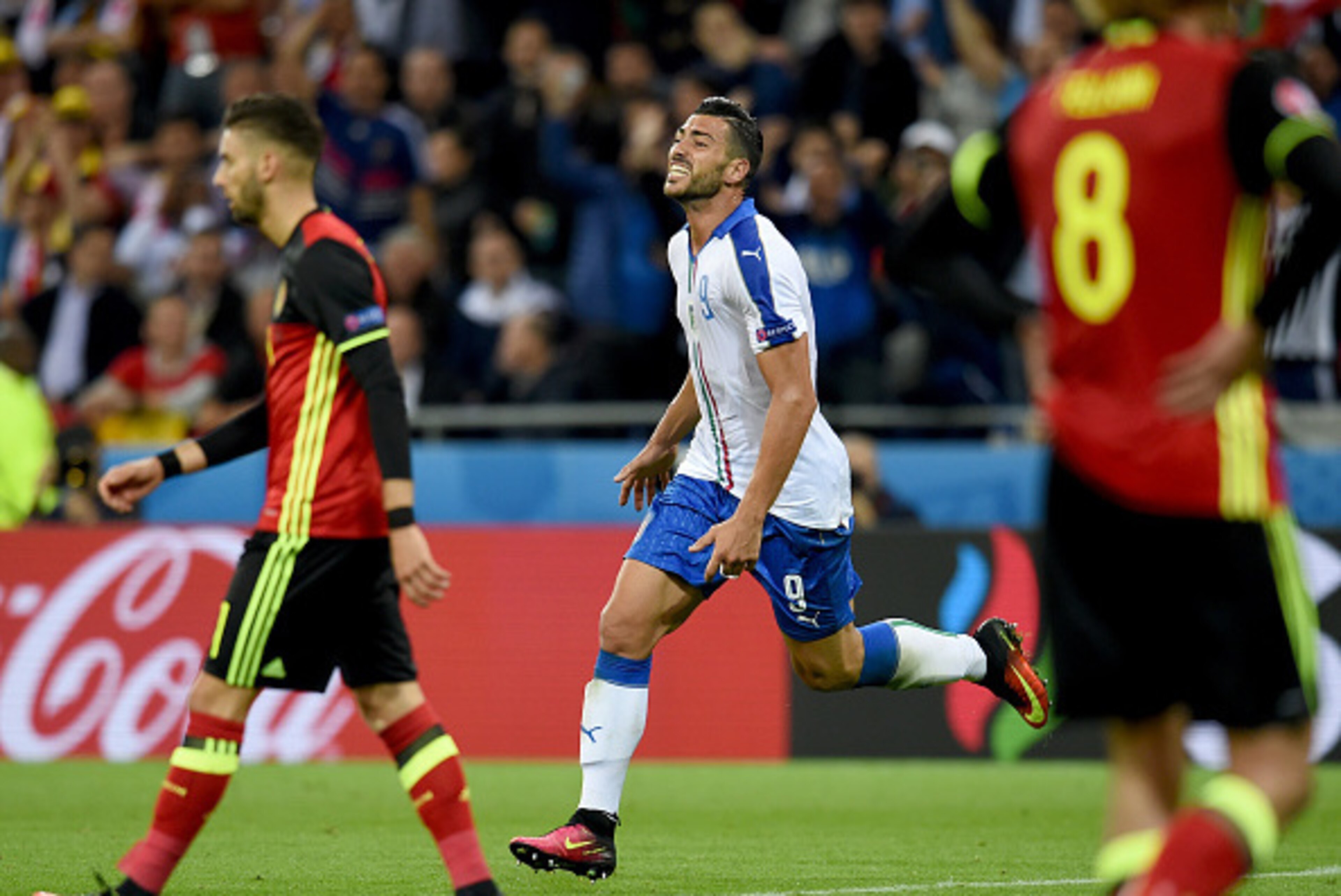 Graziano Pelle of Italy celebrates scoring his team's second goal during the UEFA EURO 2016 Group E match between Belgium and Italy at Stade des Lumieres on June 13, 2016 in Lyon, France.