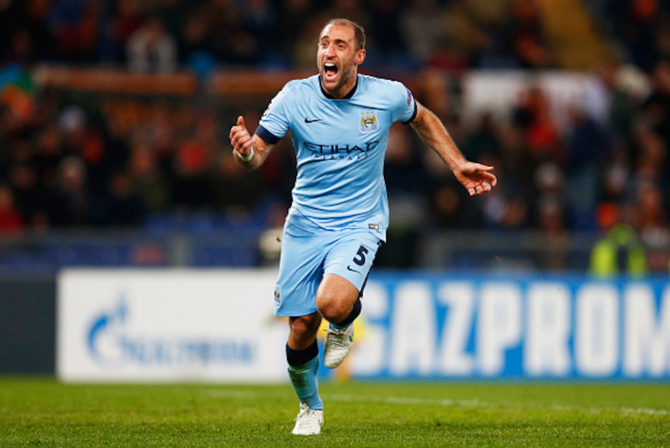ROME, ITALY - DECEMBER 10: Pablo Zabaleta of Manchester City celebrates as he scores their second goal during the UEFA Champions League Group E match between AS Roma and Manchester City FC at Stadio Olimpico on December 10, 2014 in Rome, Italy. (Photo b ROME, ITALY - DECEMBER 10: Pablo Zabaleta of Manchester City celebrates as he scores their second goal during the UEFA Champions League Group E match between AS Roma and Manchester City FC at Stadio Olimpico on December 10, 2014 in Rome, Italy. (Photo b