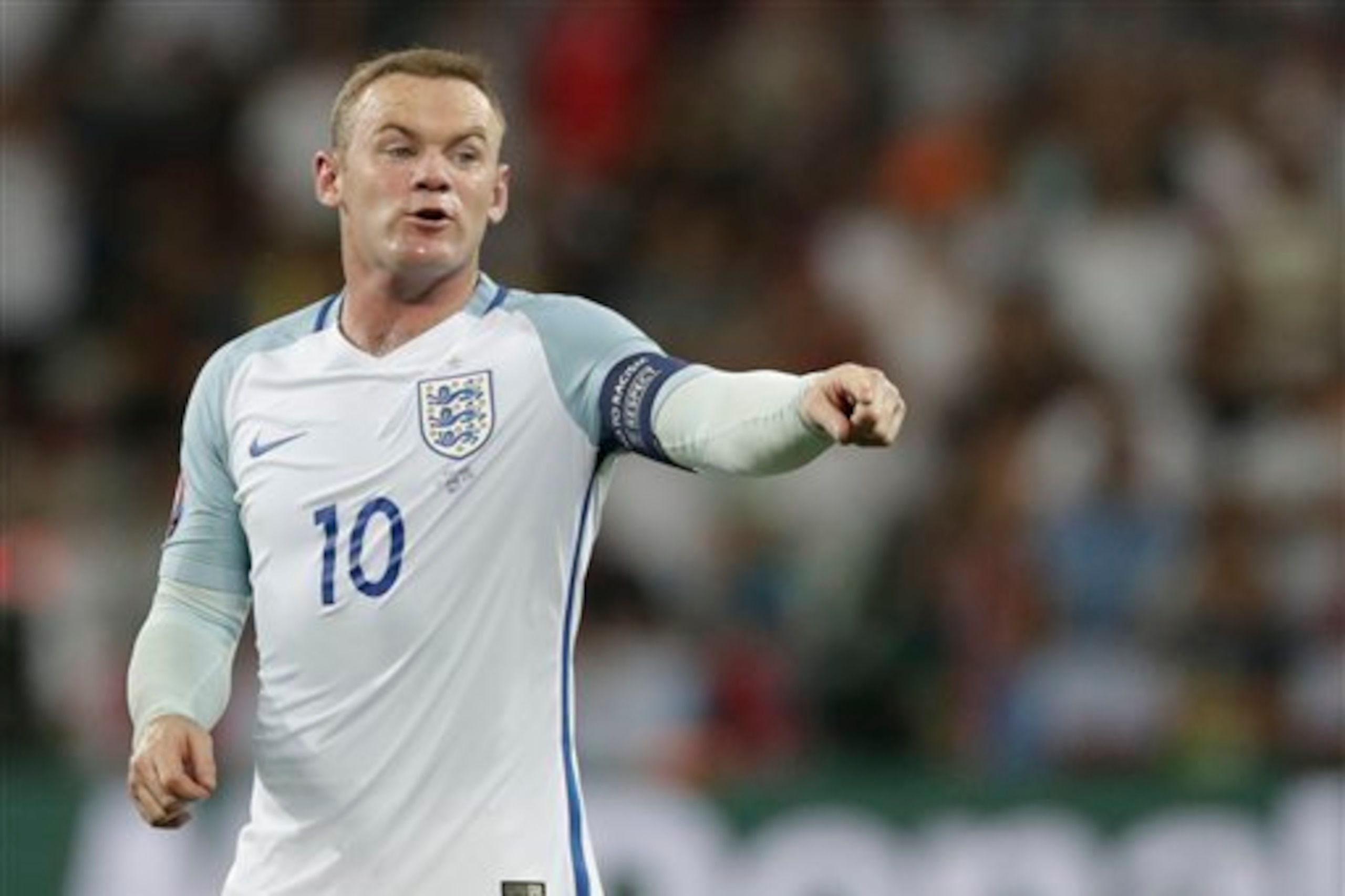 Rooney in action as England captain. Rooney in action as England captain.