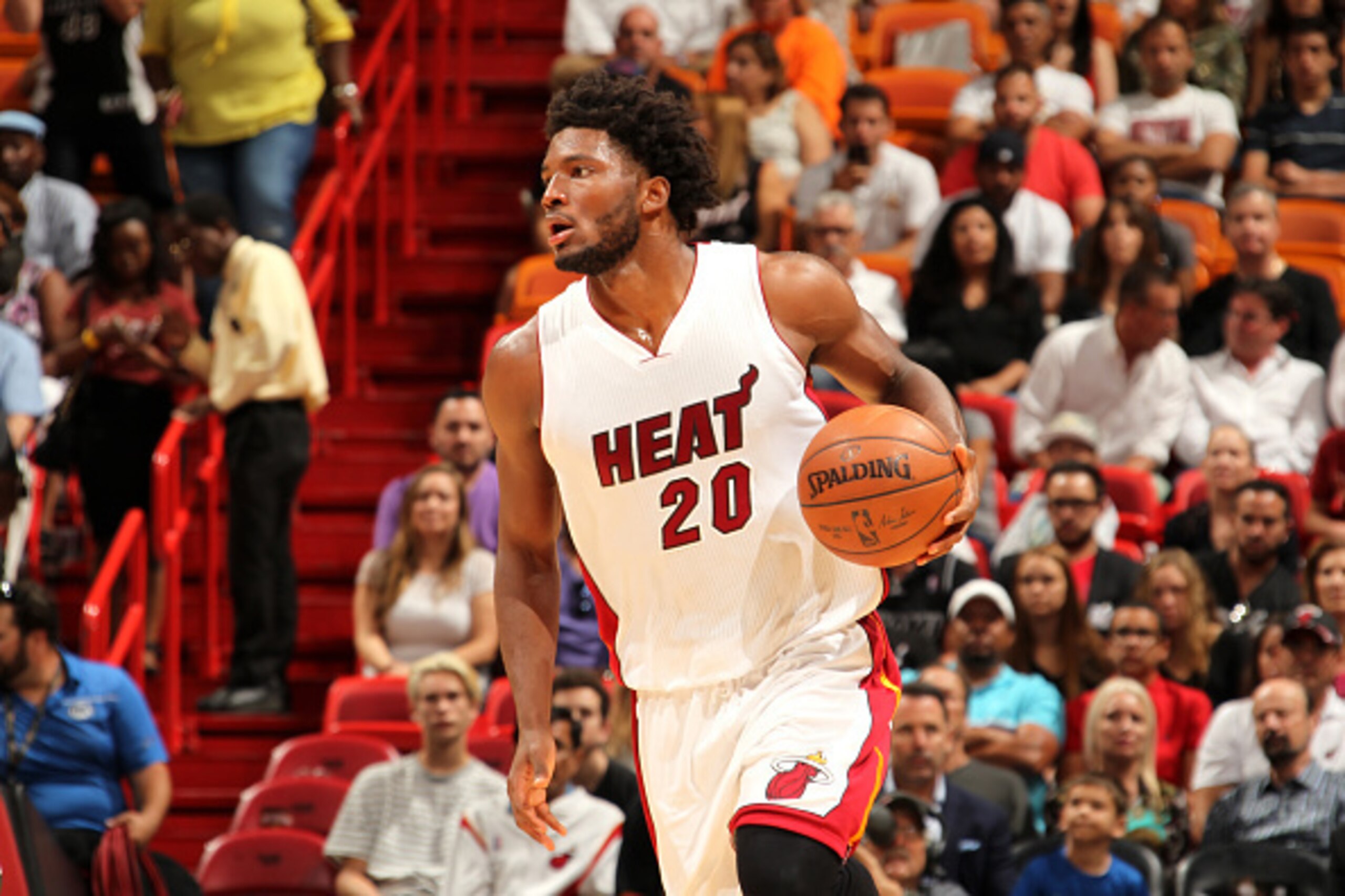 MIAMI, FL - APRIL 10: Justise Winslow #20 of the Miami Heat handles the ball during the game against the Orlando Magic on April 10, 2016 at AmericanAirlines Arena in Miami, Florida. NOTE TO USER: User expressly acknowledges and agrees that, by downloading MIAMI, FL - APRIL 10: Justise Winslow #20 of the Miami Heat handles the ball during the game against the Orlando Magic on April 10, 2016 at AmericanAirlines Arena in Miami, Florida. NOTE TO USER: User expressly acknowledges and agrees that, by downloading