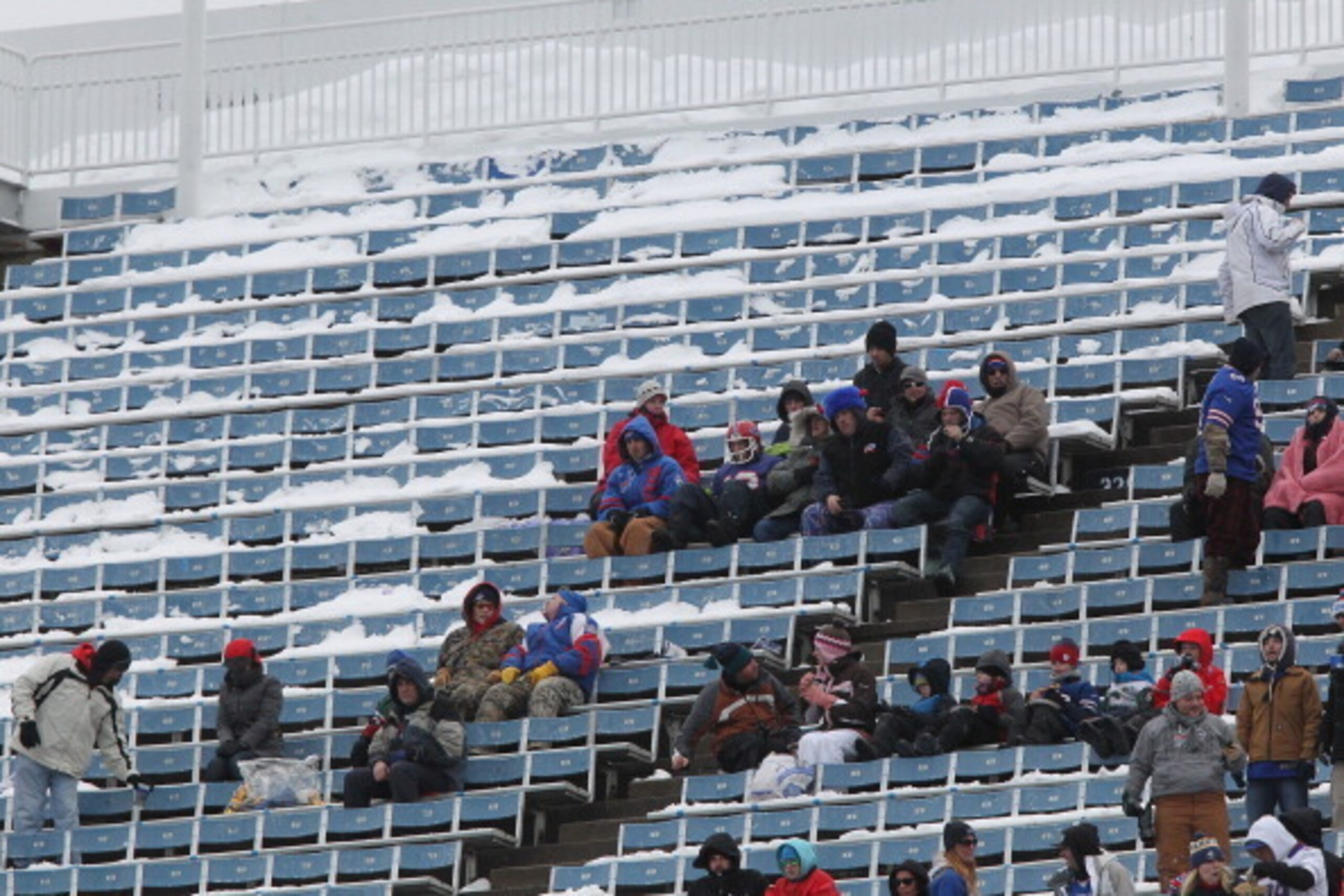 ORCHARD PARK, NY - DECEMBER 30: View of fans in snow-covered seats during the game against the New York Jets and the Buffalo Bills when the Buffalo Bills host the New York Jets at Ralph Wilson Stadium on December 30, 2012 in Orchard Park, New York. (Photo