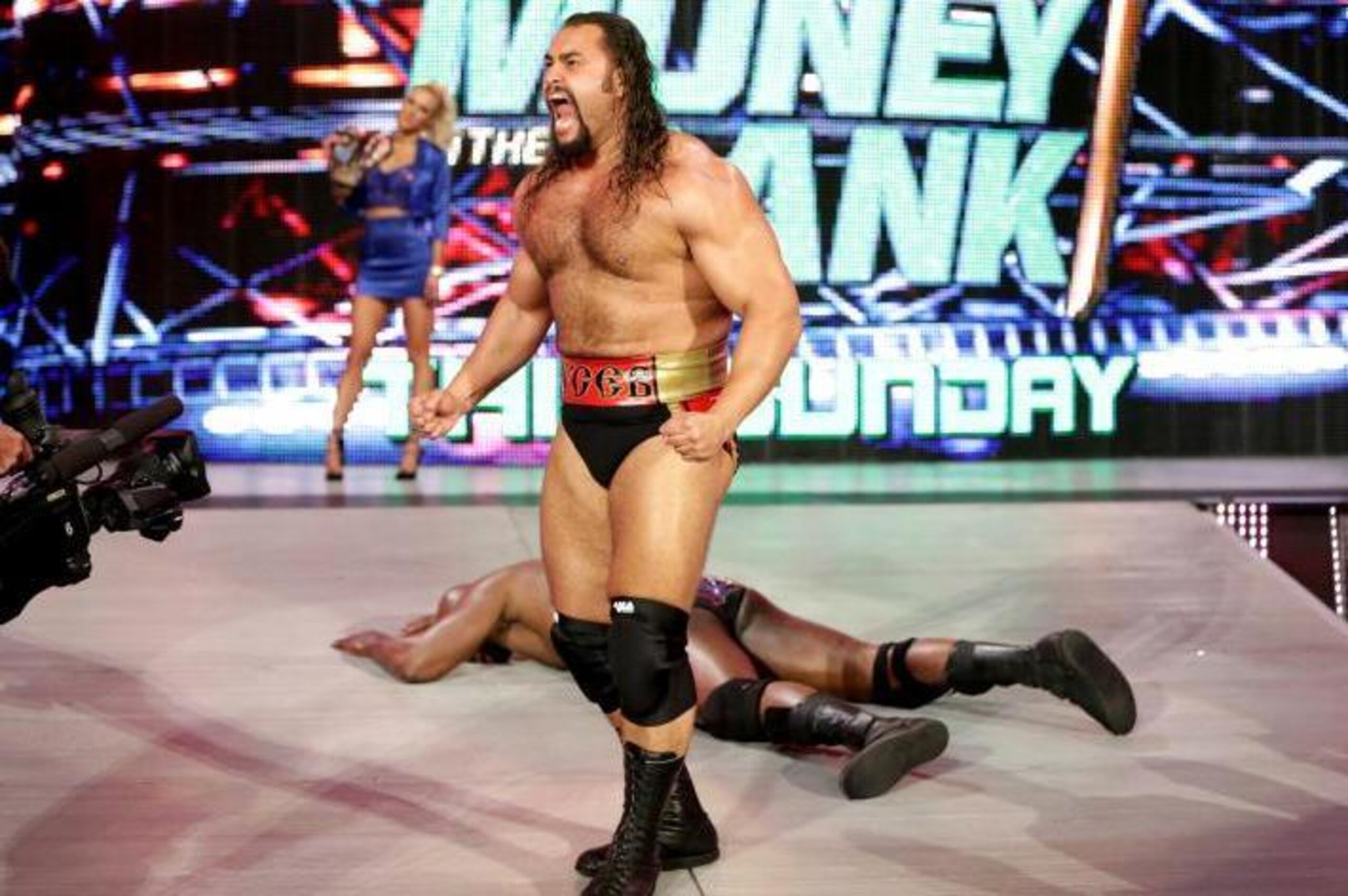 Rusev leaves Titus O'Neil lying before Money in the Bank.