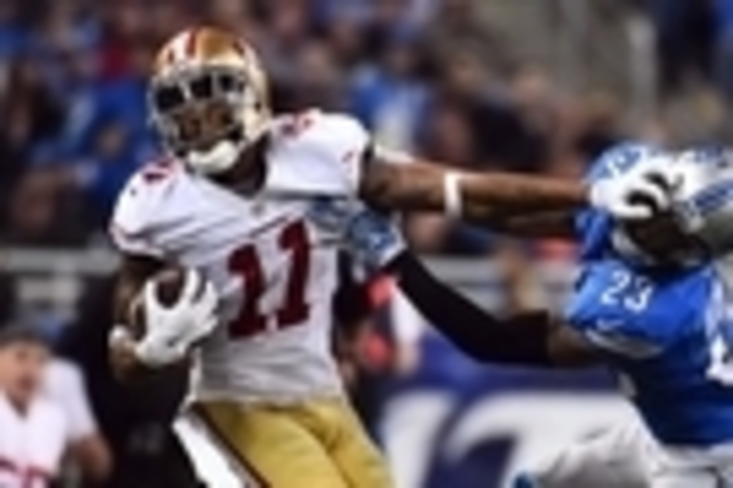 Dec 27, 2015; Detroit, MI, USA; Detroit Lions cornerback Darius Slay (23) attempts to tackle San Francisco 49ers wide receiver Quinton Patton (11) during the third quarter at Ford Field. Mandatory Credit: Tim Fuller-USA TODAY Sports
