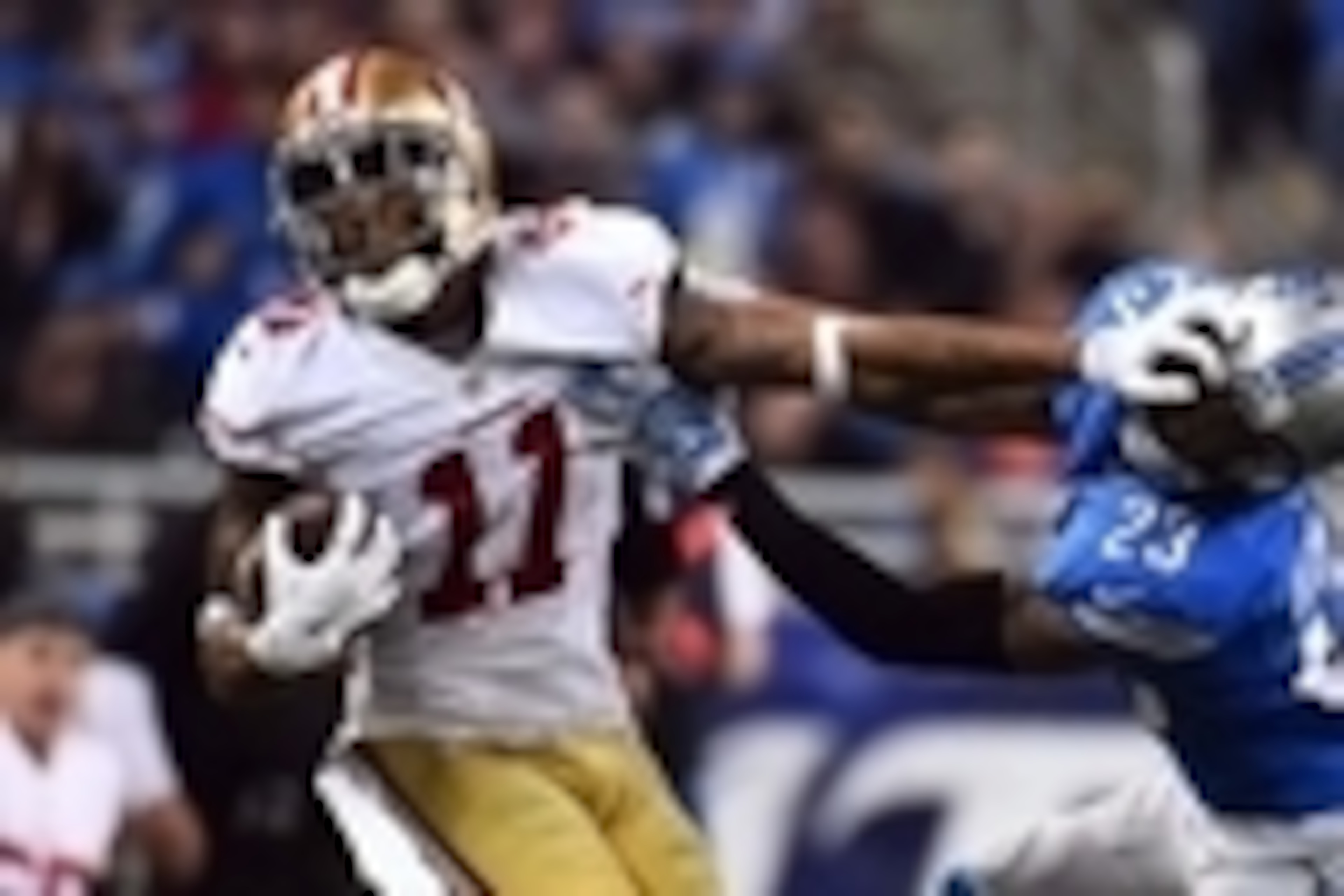Dec 27, 2015; Detroit, MI, USA; Detroit Lions cornerback Darius Slay (23) attempts to tackle San Francisco 49ers wide receiver Quinton Patton (11) during the third quarter at Ford Field. Mandatory Credit: Tim Fuller-USA TODAY Sports Dec 27, 2015; Detroit, MI, USA; Detroit Lions cornerback Darius Slay (23) attempts to tackle San Francisco 49ers wide receiver Quinton Patton (11) during the third quarter at Ford Field. Mandatory Credit: Tim Fuller-USA TODAY Sports