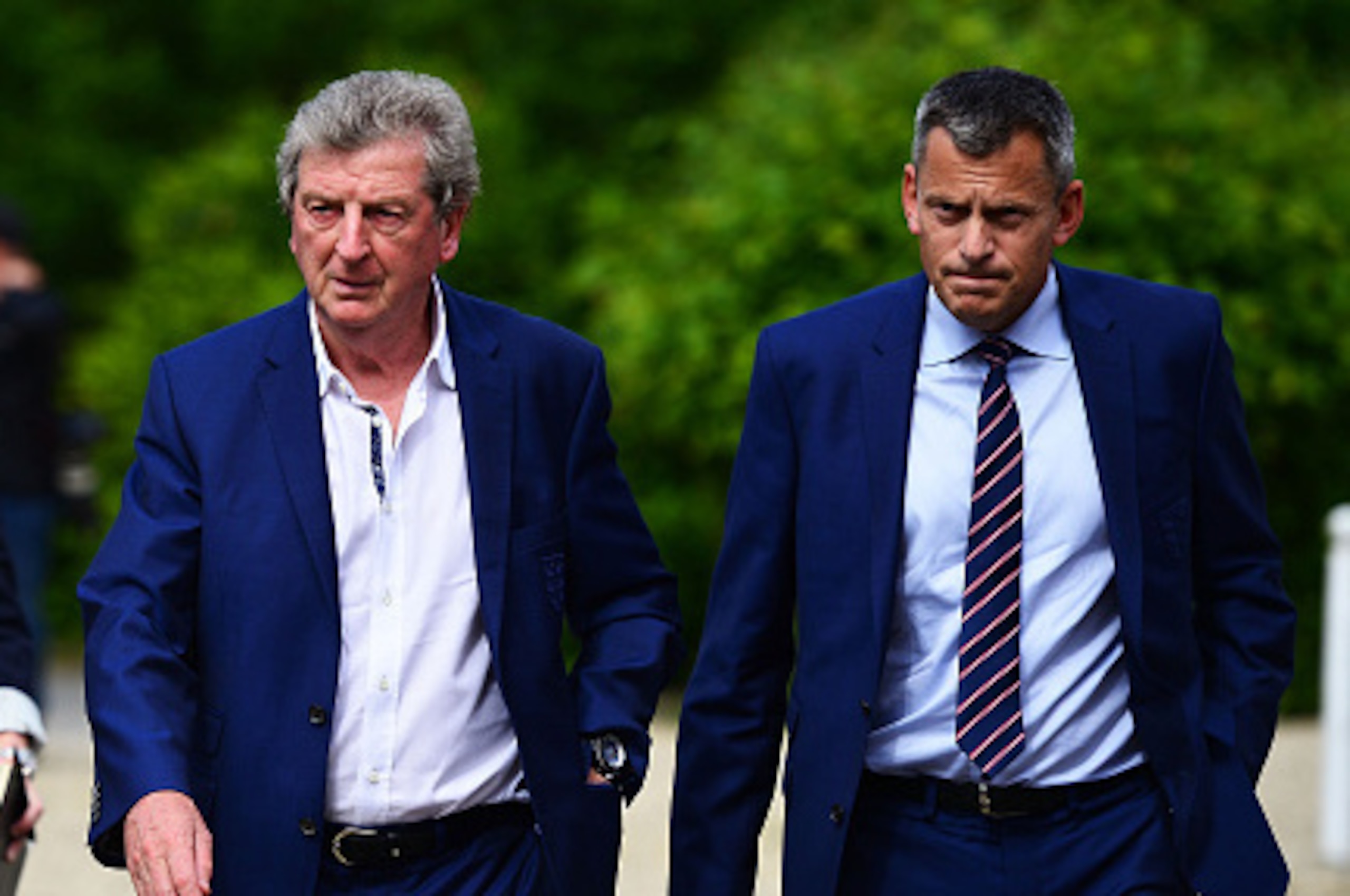 CHANTILLY, FRANCE - JUNE 28:  Roy Hodgson (C), Martin Glenn (R), CEO of the FA and Amanda Doherty (L), FA Director of Communications arrive for a press conference on June 28, 2016 in Chantilly, France.  (Photo by Dan Mullan/Getty Images)
