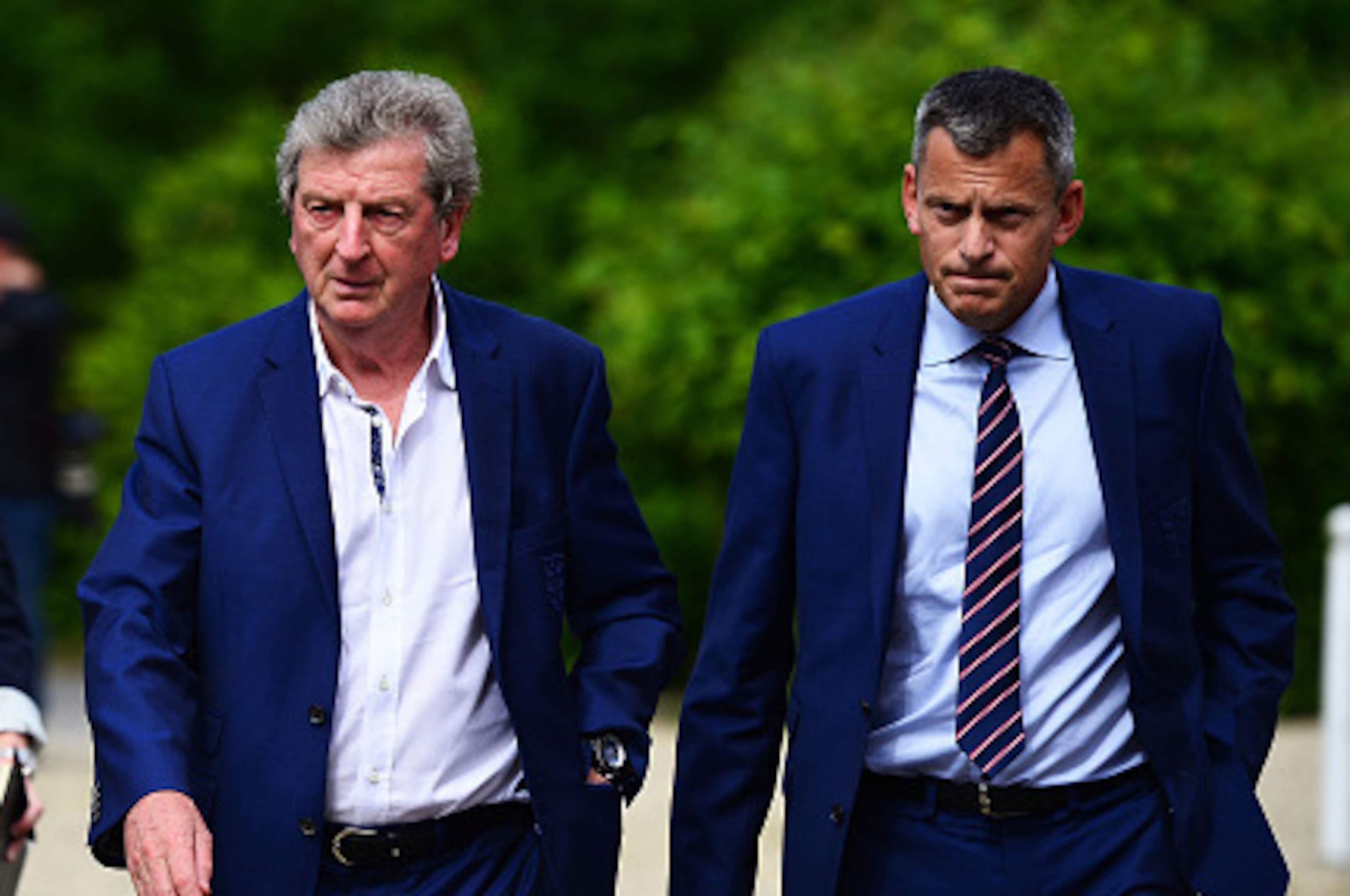 CHANTILLY, FRANCE - JUNE 28:  Roy Hodgson (C), Martin Glenn (R), CEO of the FA and Amanda Doherty (L), FA Director of Communications arrive for a press conference on June 28, 2016 in Chantilly, France.  (Photo by Dan Mullan/Getty Images)