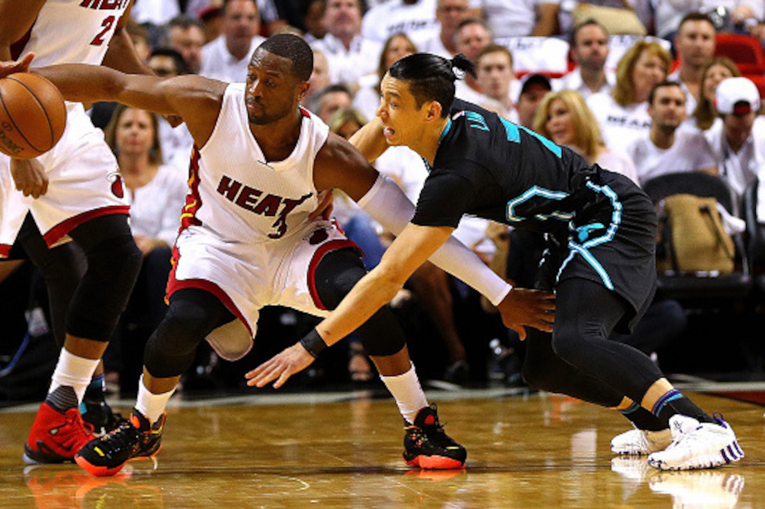 MIAMI, FL - MAY 01:  Dwyane Wade #3 of the Miami Heat is guarded by Jeremy Lin #7 of the Charlotte Hornets during Game Seven of the Eastern Conference Quarterfinals of the 2016 NBA Playoffs at American Airlines Arena on May 1, 2016 in Miami, Florida. NOTE