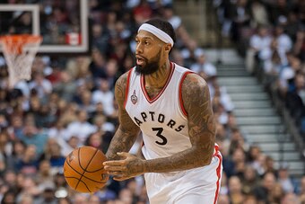 TORONTO, ON - JANUARY 22: Forward James Johnson #3 of the Toronto Raptors handles the ball against Miami Heat in the fourth quarter at Air Canada Centre on January 22, 2016 in Toronto, Canada. NOTE TO USER: User expressly acknowledges and agrees that, by 