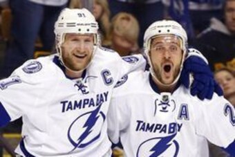 Feb 28, 2016; Boston, MA, USA; Tampa Bay Lightning right wing Ryan Callahan (24) celebrates his goal with Lightning center Steven Stamkos (91) during the first period against the Boston Bruins at TD Garden. Mandatory Credit: Winslow Townson-USA TODAY Spor