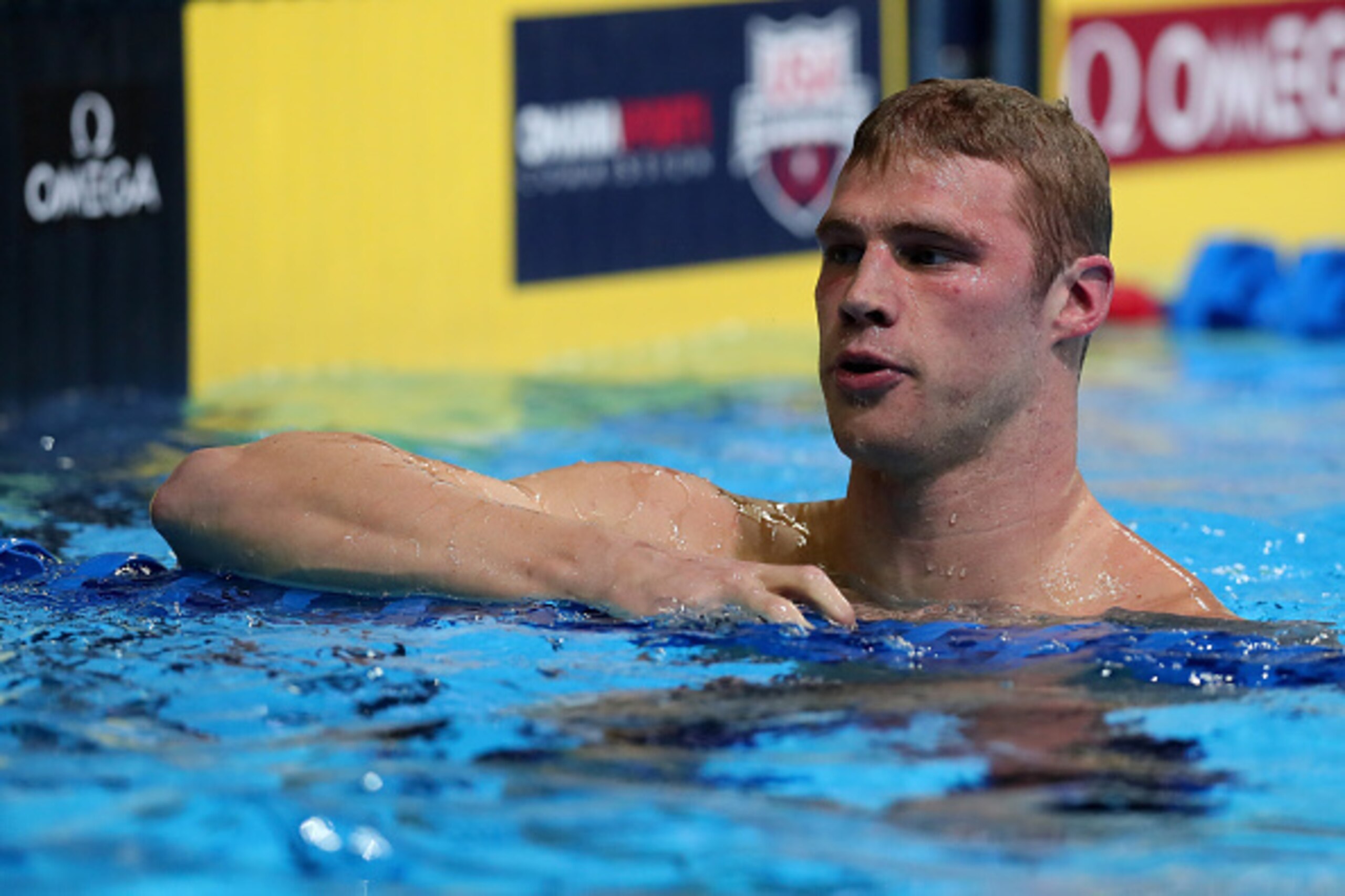 OMAHA, NE - JUNE 29:  Kevin Cordes of the United States reacts after breaking a new US record after competing in a semi-final heat for the Men's 200 Meter Breaststroke during Day Four of the 2016 U.S. Olympic Team Swimming Trials at CenturyLink Center on 