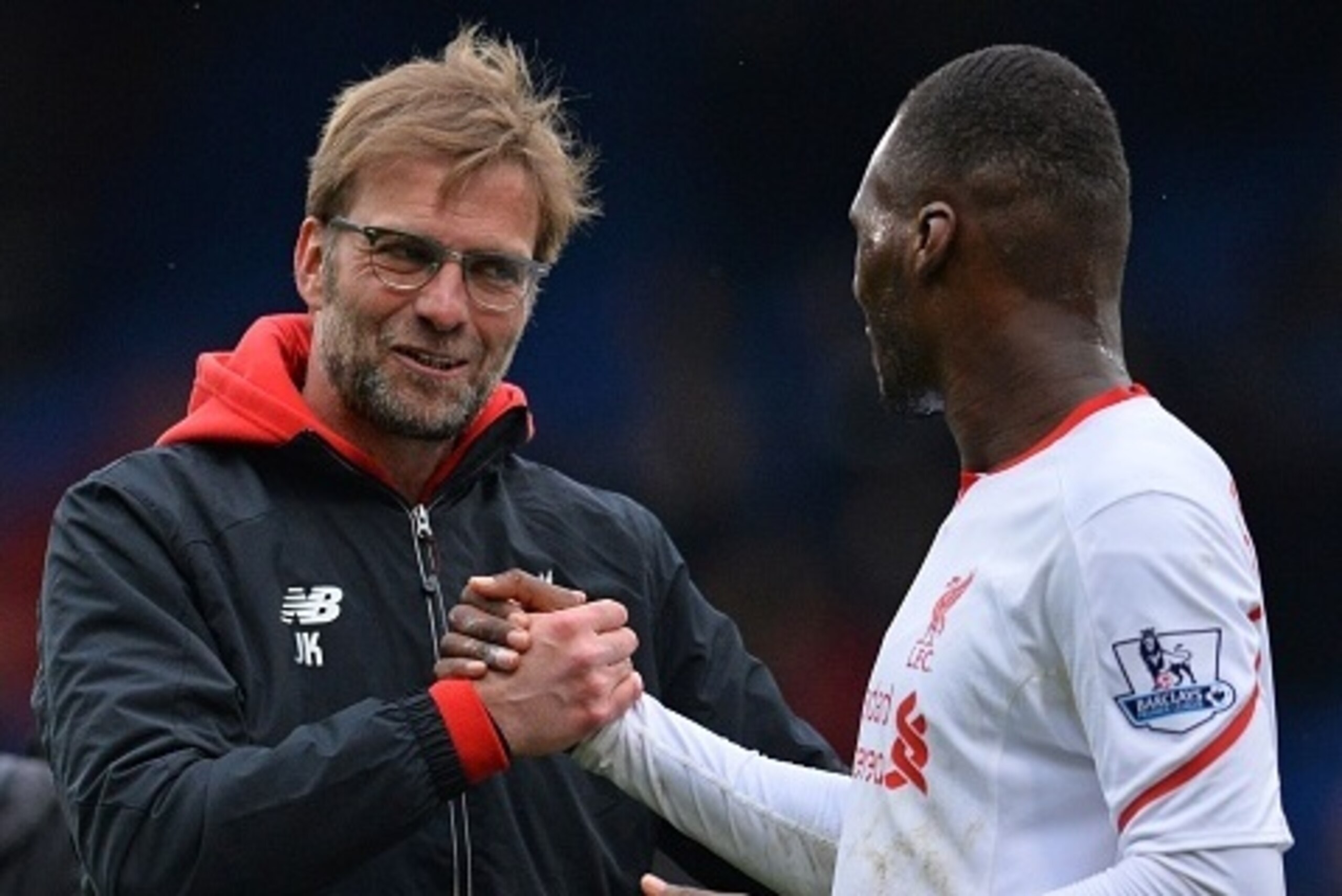 Liverpool's German manager Jurgen Klopp (L) congratulates Liverpool's Zaire-born Belgian striker Christian Benteke after the English Premier League football match between Crystal Palace and Liverpool at Selhurst Park in south London on March 6, 2016.
Live