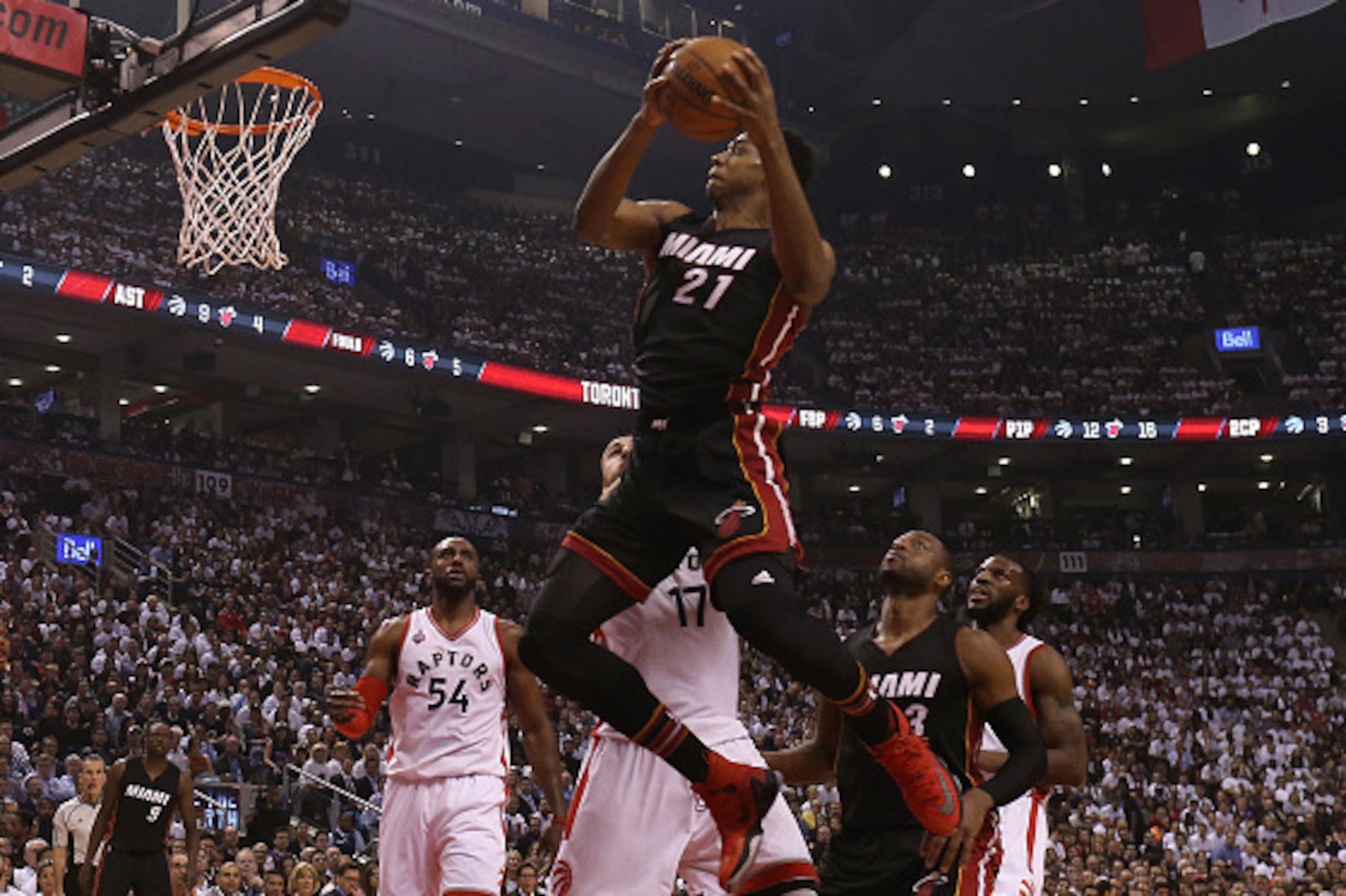 TORONTO, CANADA - MAY 5, 2016: Hassan Whiteside #21 of the Miami Heat drives to the basket against the Toronto Raptors during Game Two of the Eastern Conference Semi Finals at Air Canada Centre on May 5, 2016 in Toronto, Ontario, Canada. NOTE TO USER: Us TORONTO, CANADA - MAY 5, 2016: Hassan Whiteside #21 of the Miami Heat drives to the basket against the Toronto Raptors during Game Two of the Eastern Conference Semi Finals at Air Canada Centre on May 5, 2016 in Toronto, Ontario, Canada. NOTE TO USER: Us