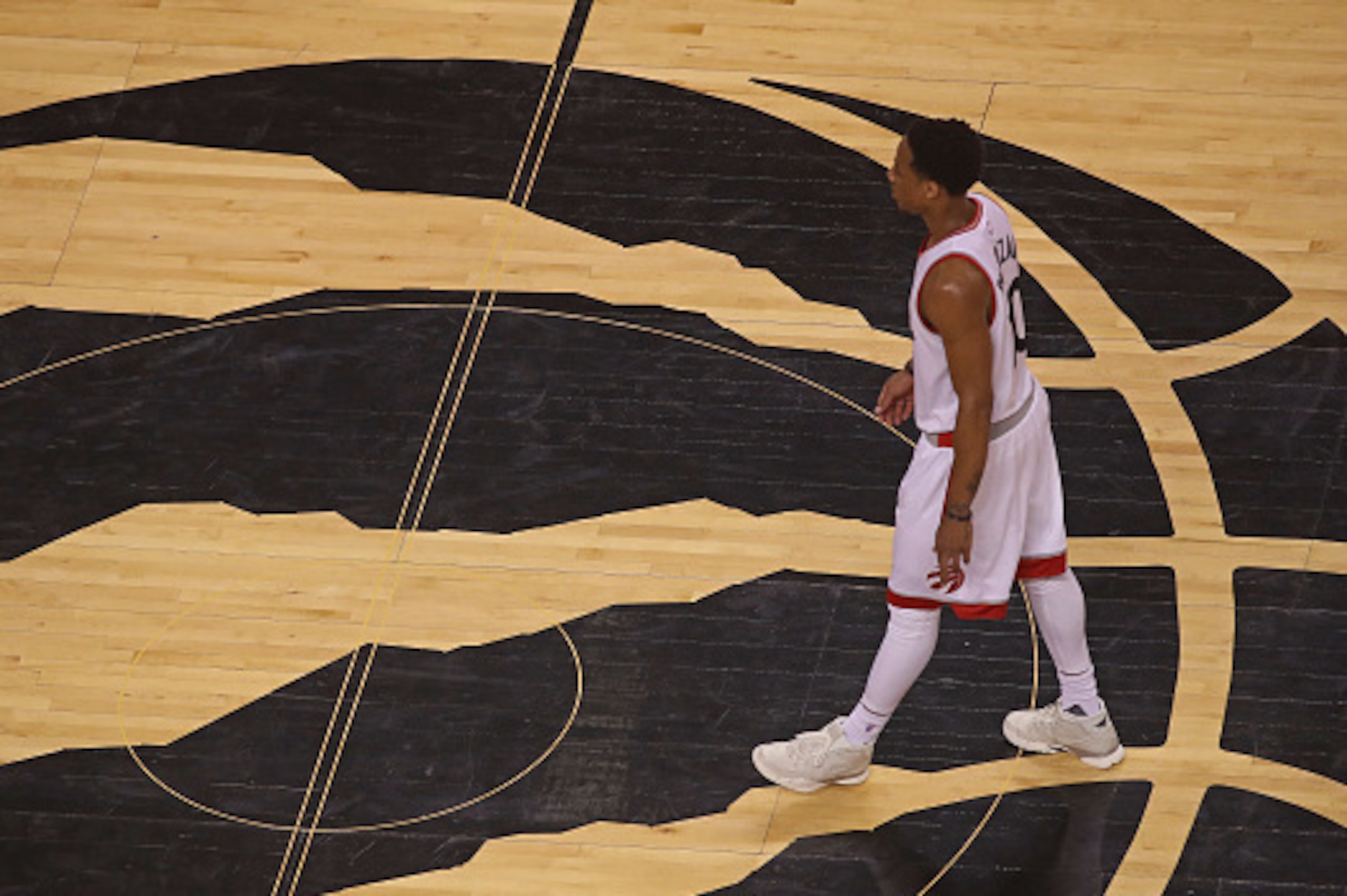 TORONTO, ON - MAY 27: DeMar DeRozan #10 of the Toronto Raptors walks up court in Game Six of the NBA Eastern Conference Finals against the Cleveland Cavaliers at Air Canada Centre on May 27, 2016 in Toronto, Ontario, Canada. NOTE TO USER: User expressly TORONTO, ON - MAY 27: DeMar DeRozan #10 of the Toronto Raptors walks up court in Game Six of the NBA Eastern Conference Finals against the Cleveland Cavaliers at Air Canada Centre on May 27, 2016 in Toronto, Ontario, Canada. NOTE TO USER: User expressly