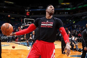 MINNEAPOLIS, MN -  APRIL 11: Dwight Howard #12 of the Houston Rockets warms up before the game against the Minnesota Timberwolves on April 11, 2016 at Target Center in Minneapolis, Minnesota. NOTE TO USER: User expressly acknowledges and agrees that, by d
