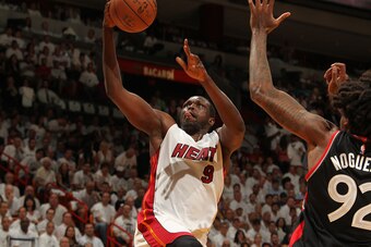 MIAMI, FL - MAY 9: Luol Deng #9 of the Miami Heat shoots the ball against the Toronto Raptors in Game Four of the Eastern Conference Semifinals at AmericanAirlines Arena on May 9, 2016 in Miami, Florida. NOTE TO USER: User expressly acknowledges and agree