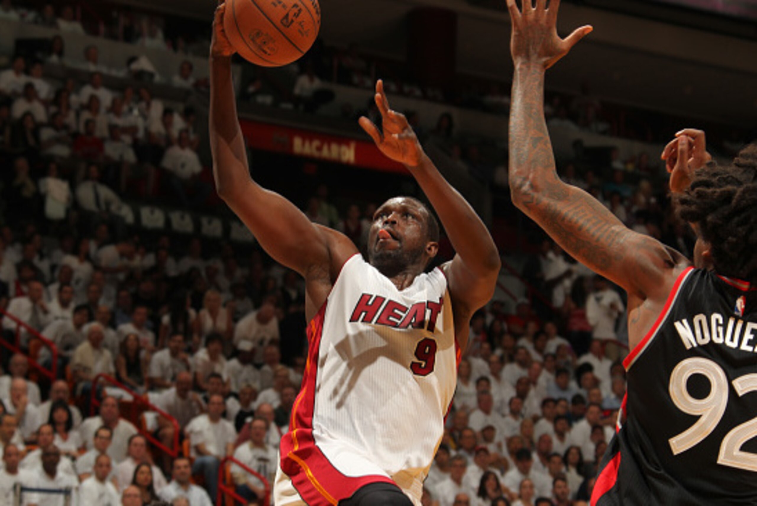 MIAMI, FL - MAY 9: Luol Deng #9 of the Miami Heat shoots the ball against the Toronto Raptors in Game Four of the Eastern Conference Semifinals at AmericanAirlines Arena on May 9, 2016 in Miami, Florida. NOTE TO USER: User expressly acknowledges and agree MIAMI, FL - MAY 9: Luol Deng #9 of the Miami Heat shoots the ball against the Toronto Raptors in Game Four of the Eastern Conference Semifinals at AmericanAirlines Arena on May 9, 2016 in Miami, Florida. NOTE TO USER: User expressly acknowledges and agree